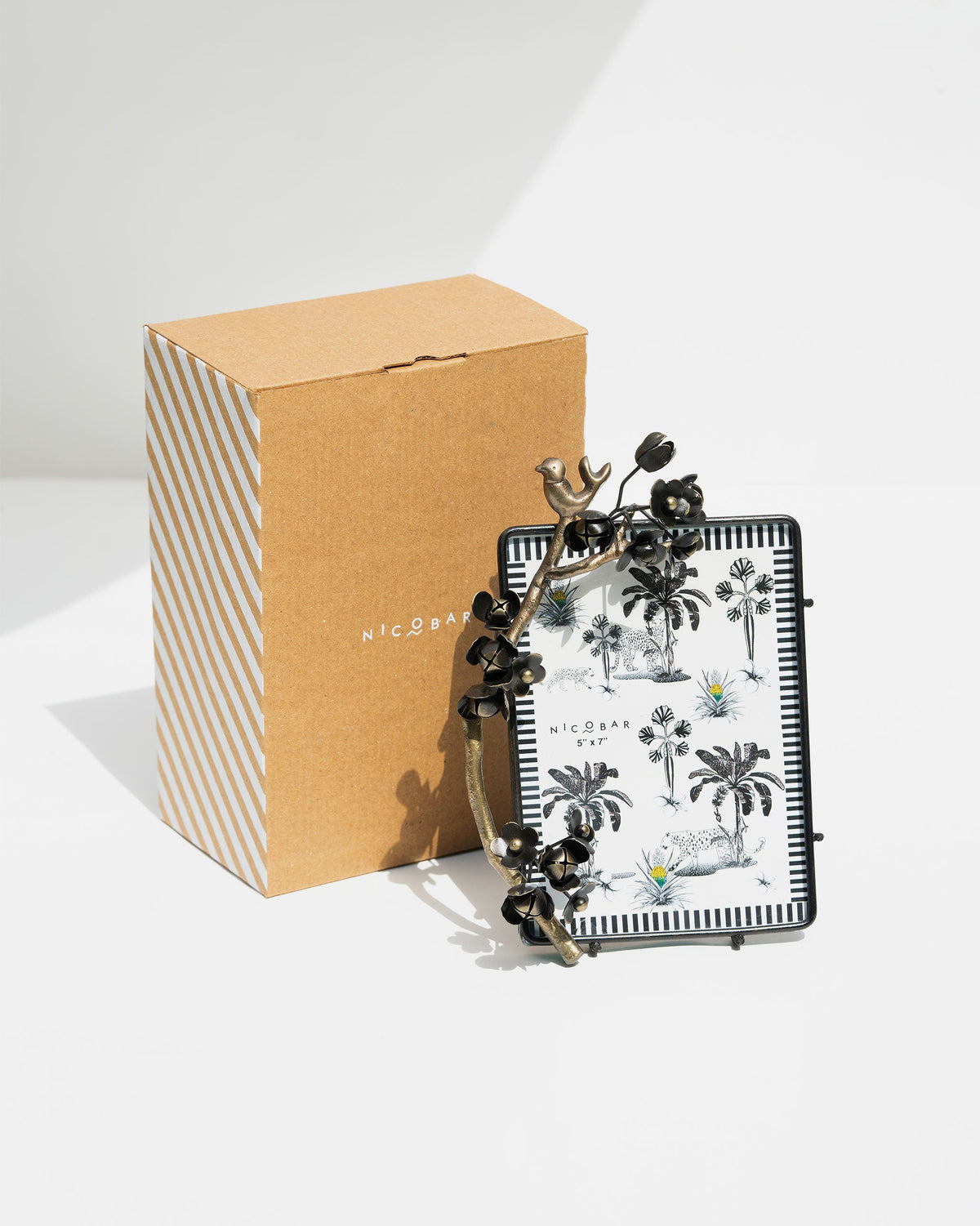 Wildflower Photo Frame beside its kraft box with a striped side.