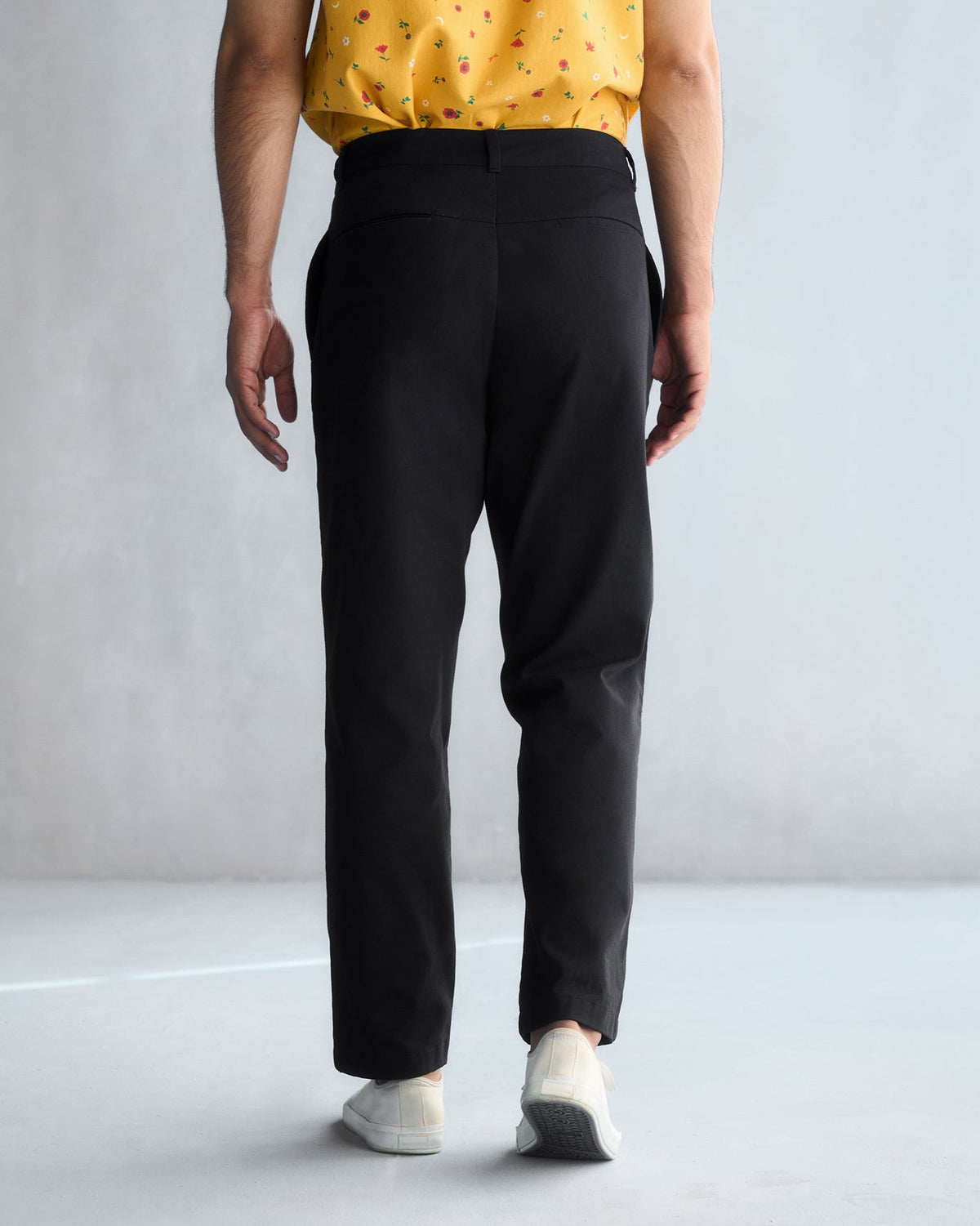 Back of black Trunk & Twill trousers worn by a person.