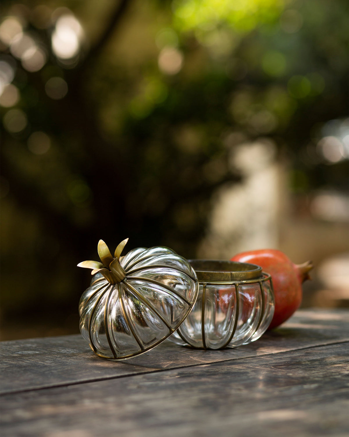 Anar Deco Jar with its lid removed and set beside the base.