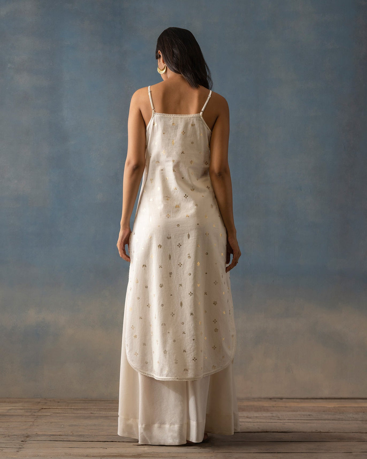 Back of an ivory Vintage Camisole Slip worn by a person.