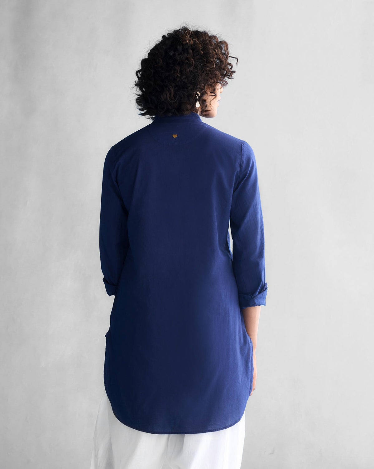Back of a blue Basic Mid Length Kurta worn by a person.