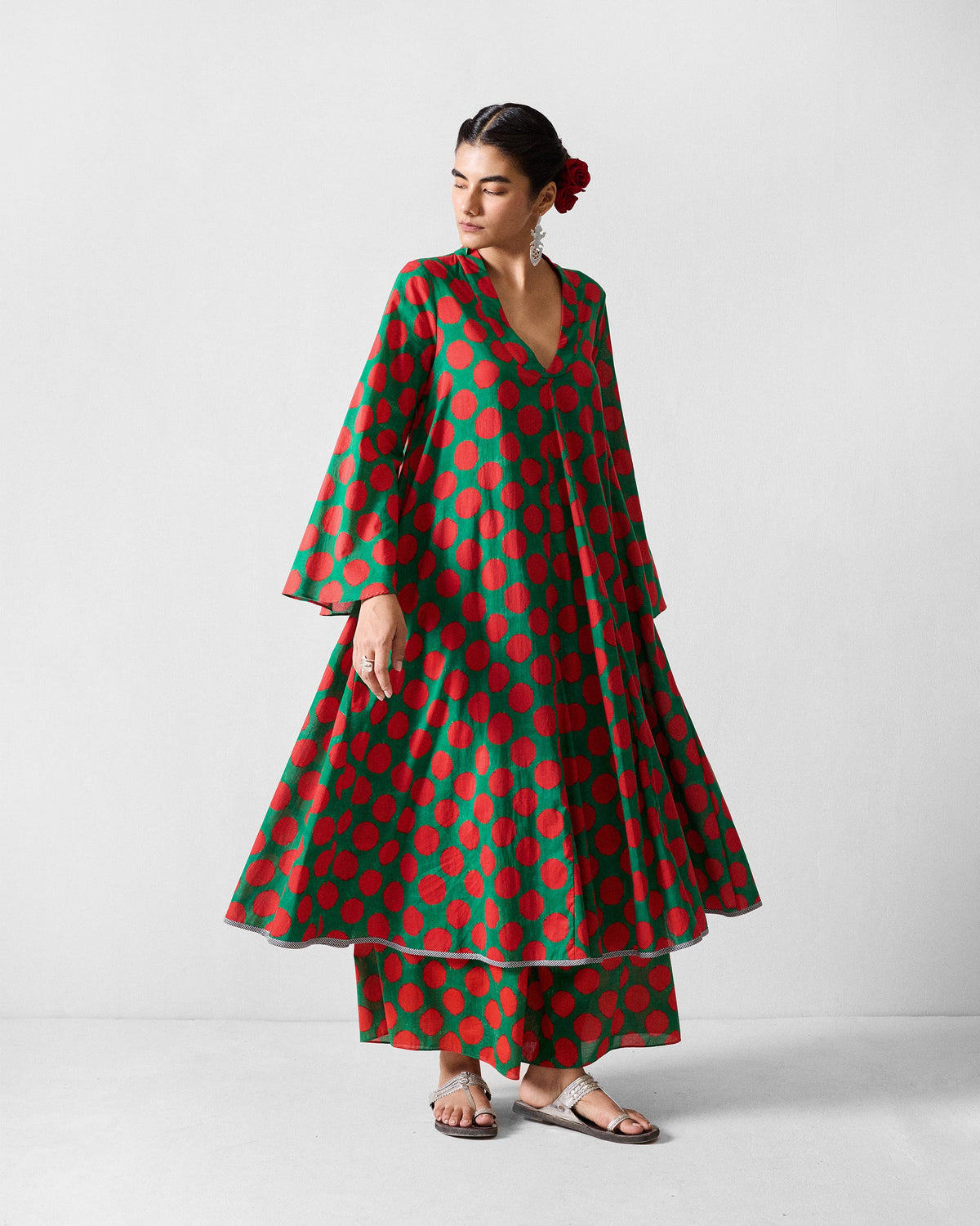 Person wearing the Talas kurta with a full, flared silhouette and wide sleeves.