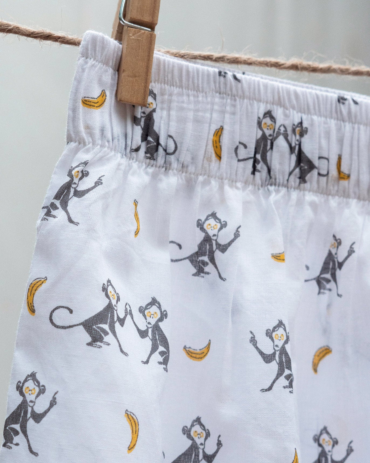 Close-up of Going Bananas Boxers showing the grey monkey and banana print.