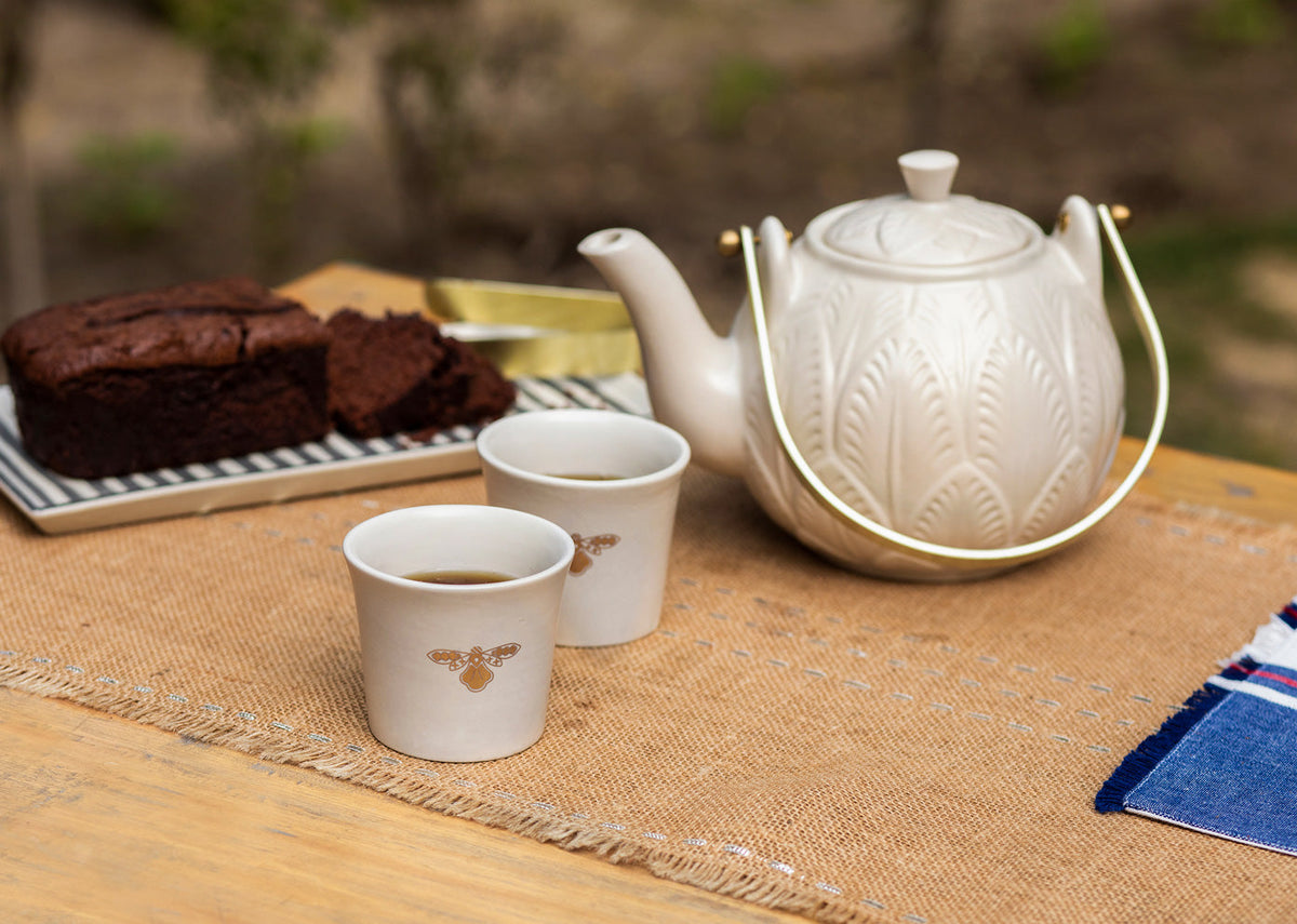Teesta teapot and teacups set for outdoor tea.