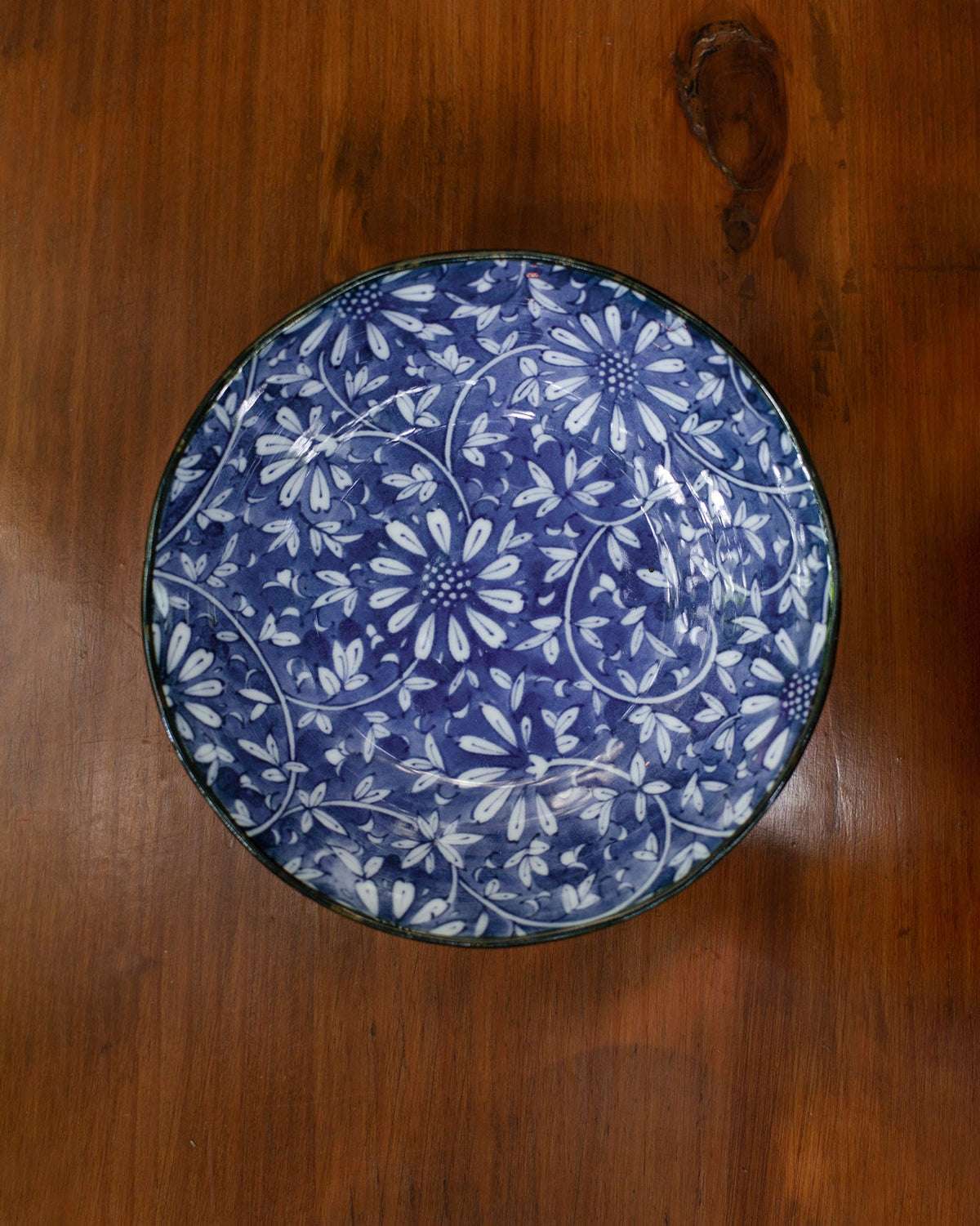 Aika Dessert Bowl seen from above, with a floral pattern across the inside.