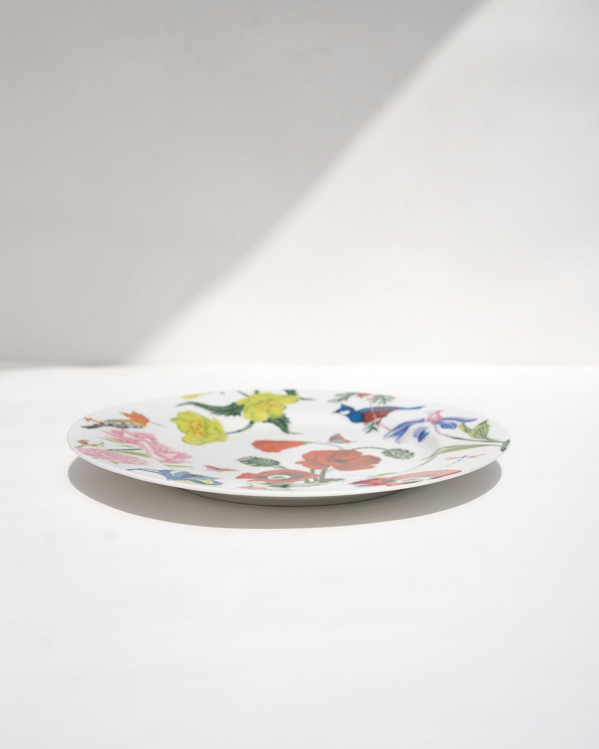 Side view of the Wildflower Dinner Plate with its floral print around the rim.
