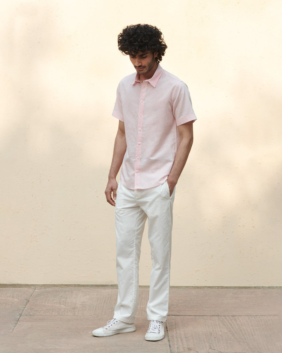 Full-length view of a pink Half Sleeve Shirt worn by a person.