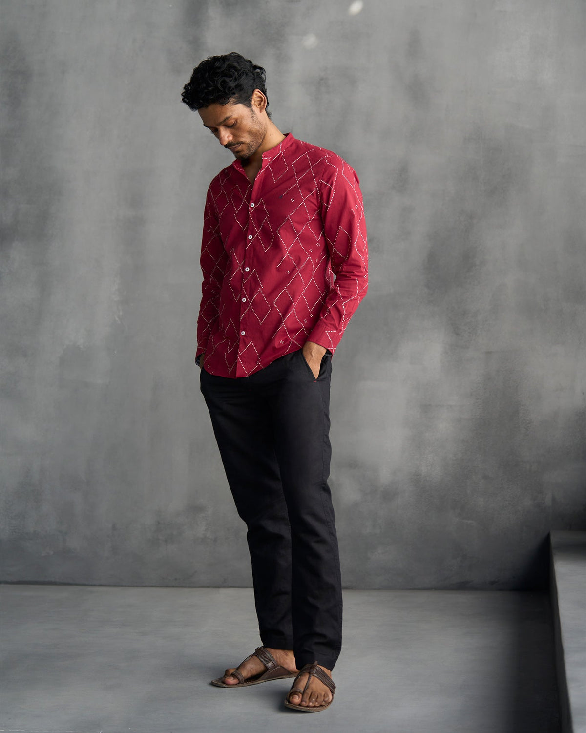 Person wearing a red Nawab shirt.