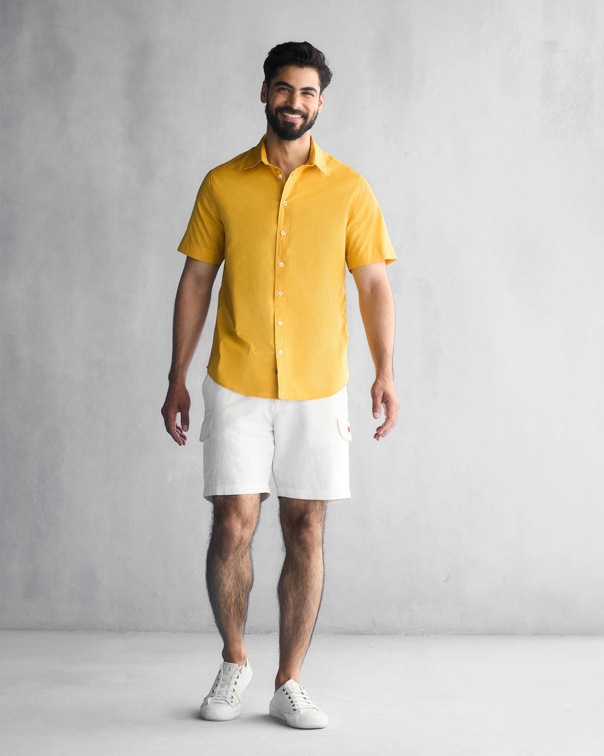 Full-length view of an ochre Half Sleeve Shirt worn by a person.