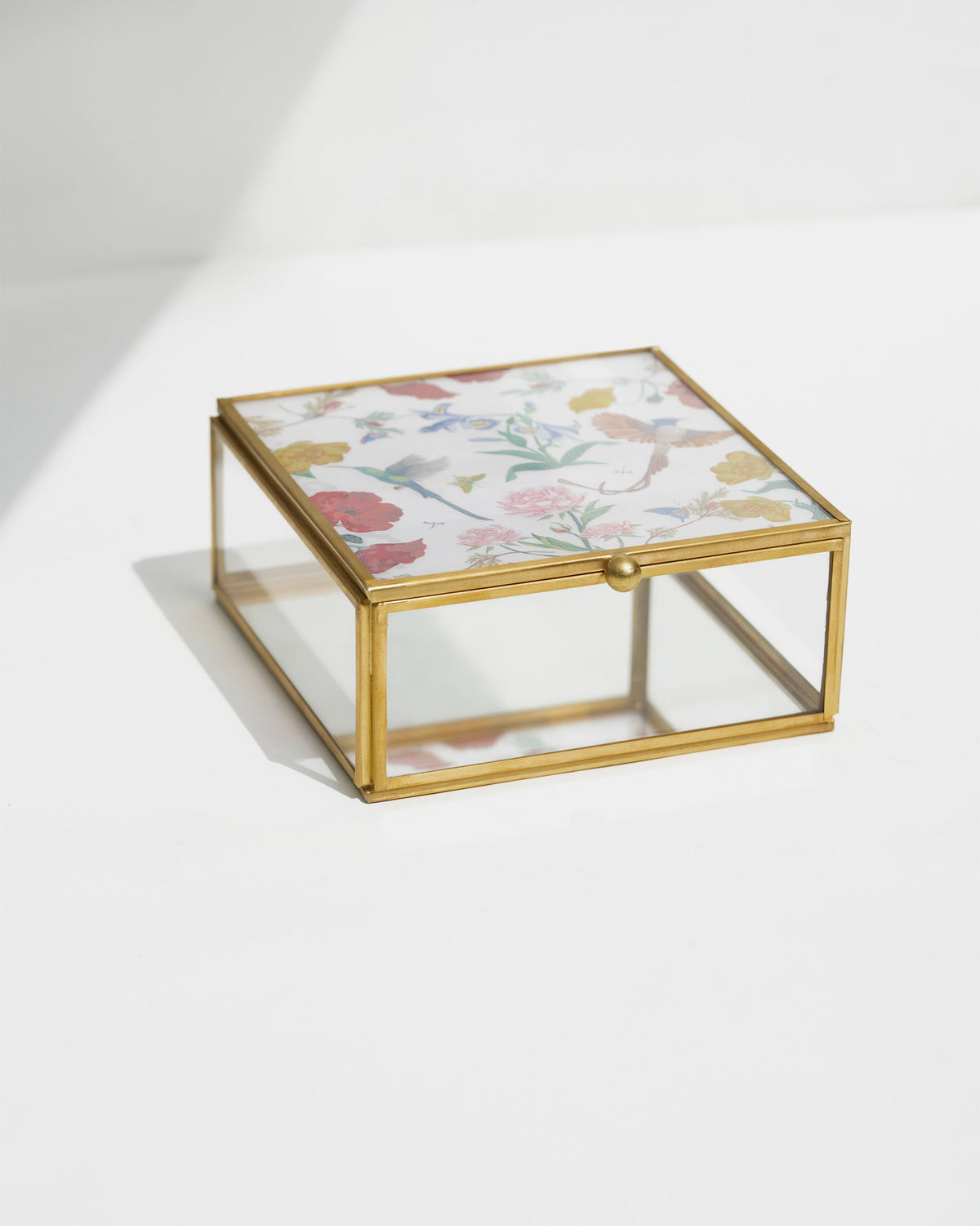 Closed Wildflower Jewellery Box showing its floral printed lid and glass sides.