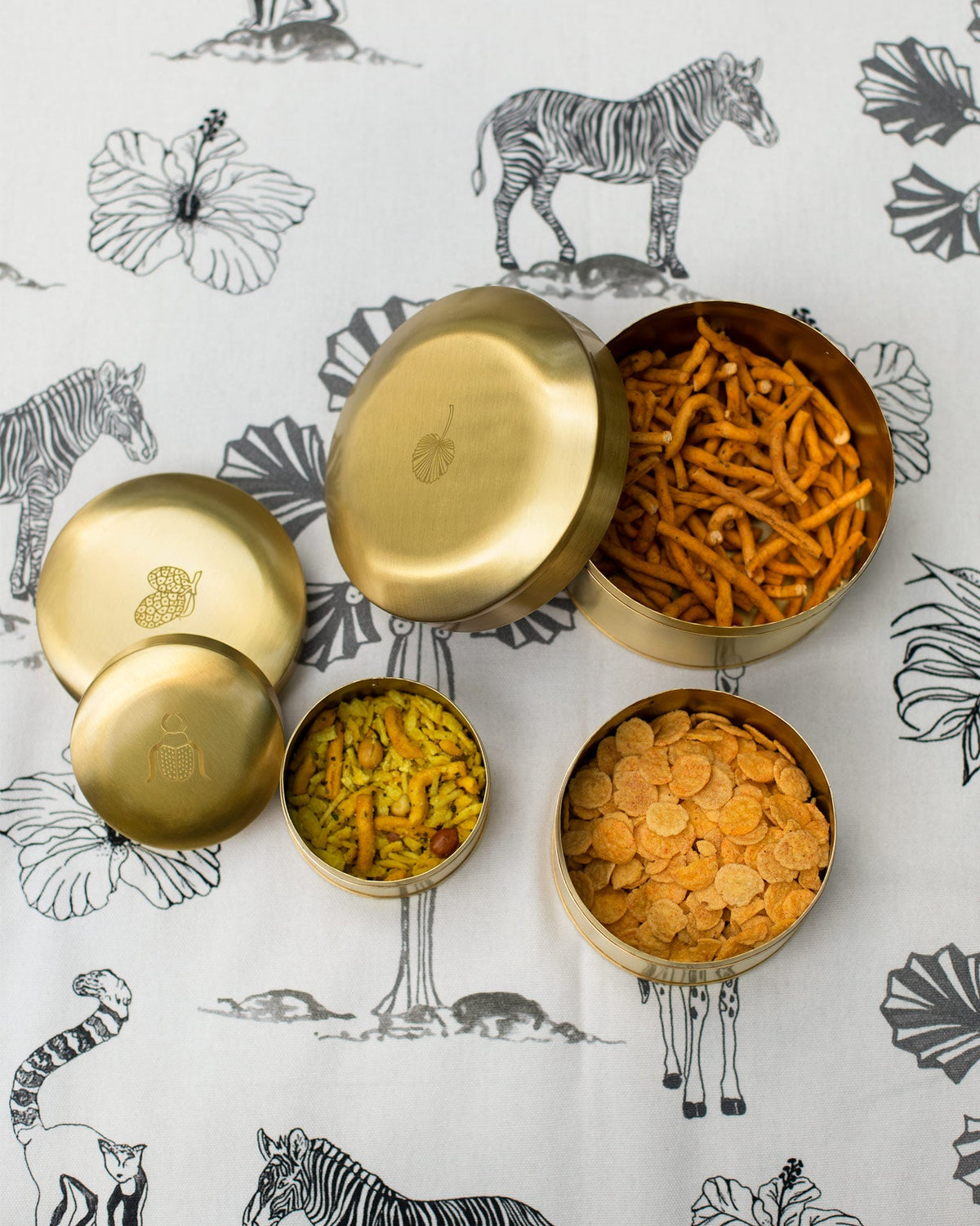 Dariya Nested Containers holding snacks, seen from above.