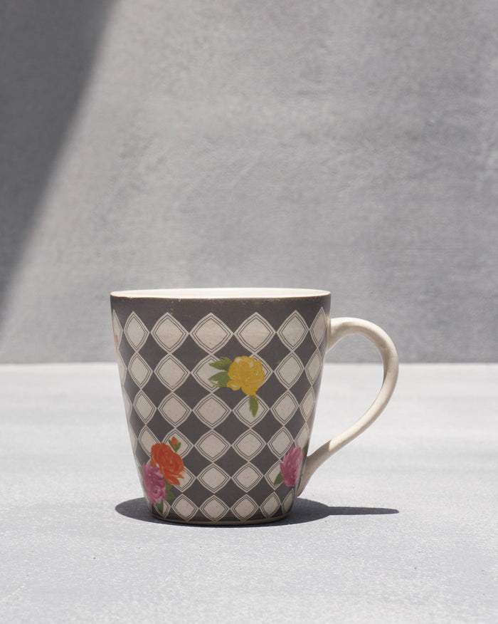 Fez Rose Mug in grey with a diamond pattern and rose prints.