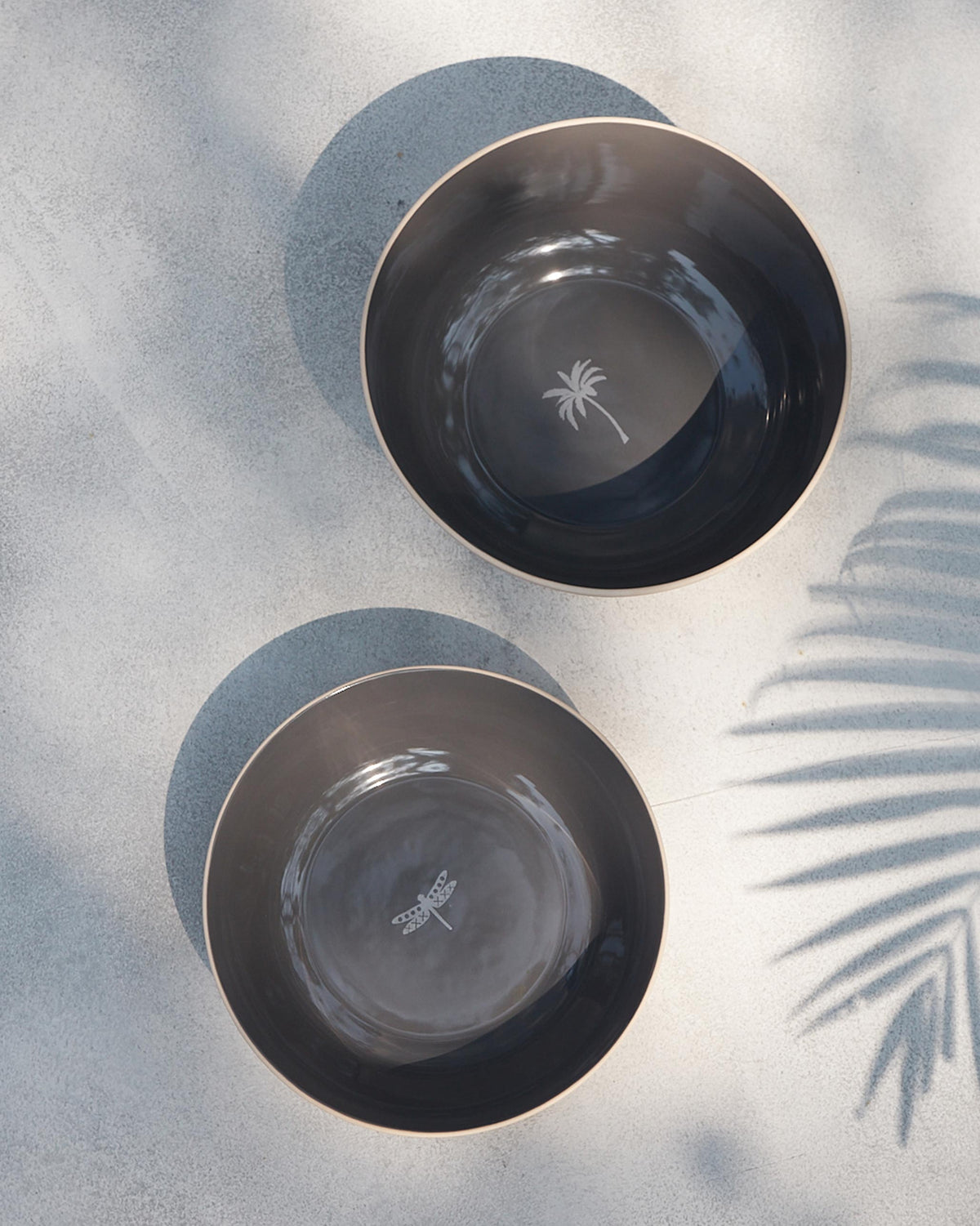 Two Kangra Vegetable Bowls seen from above, with small motifs inside, one a palm tree.