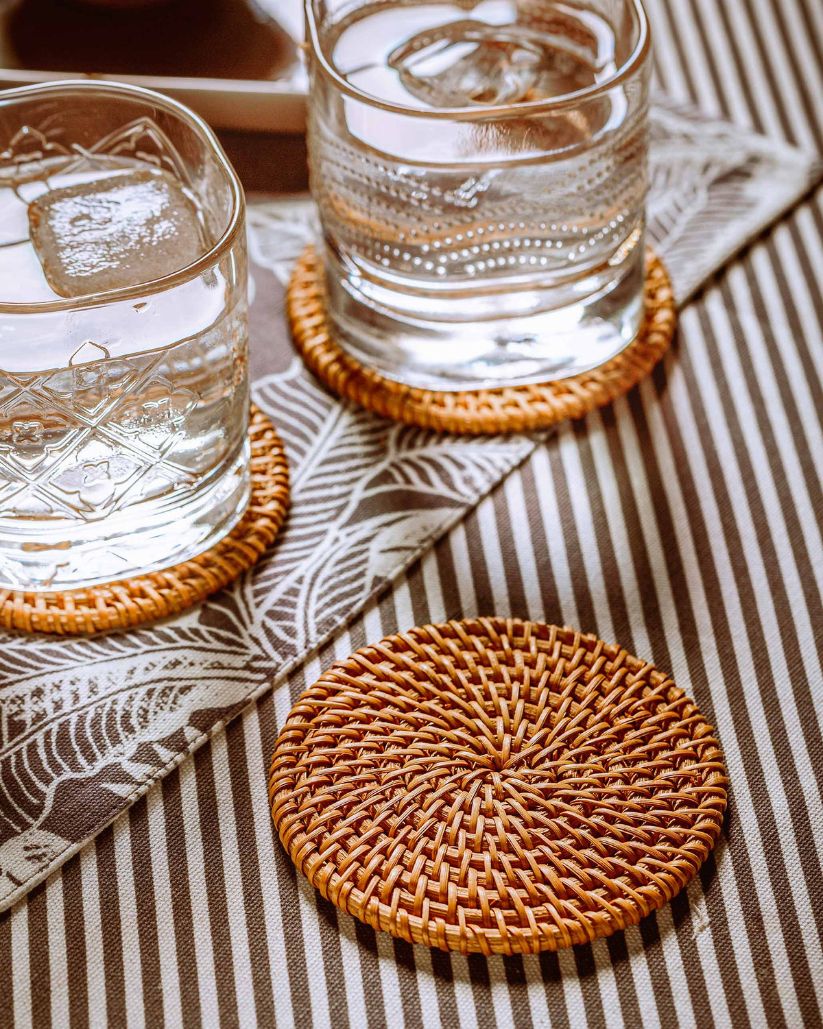 Rattan Coasters in use under two glasses.