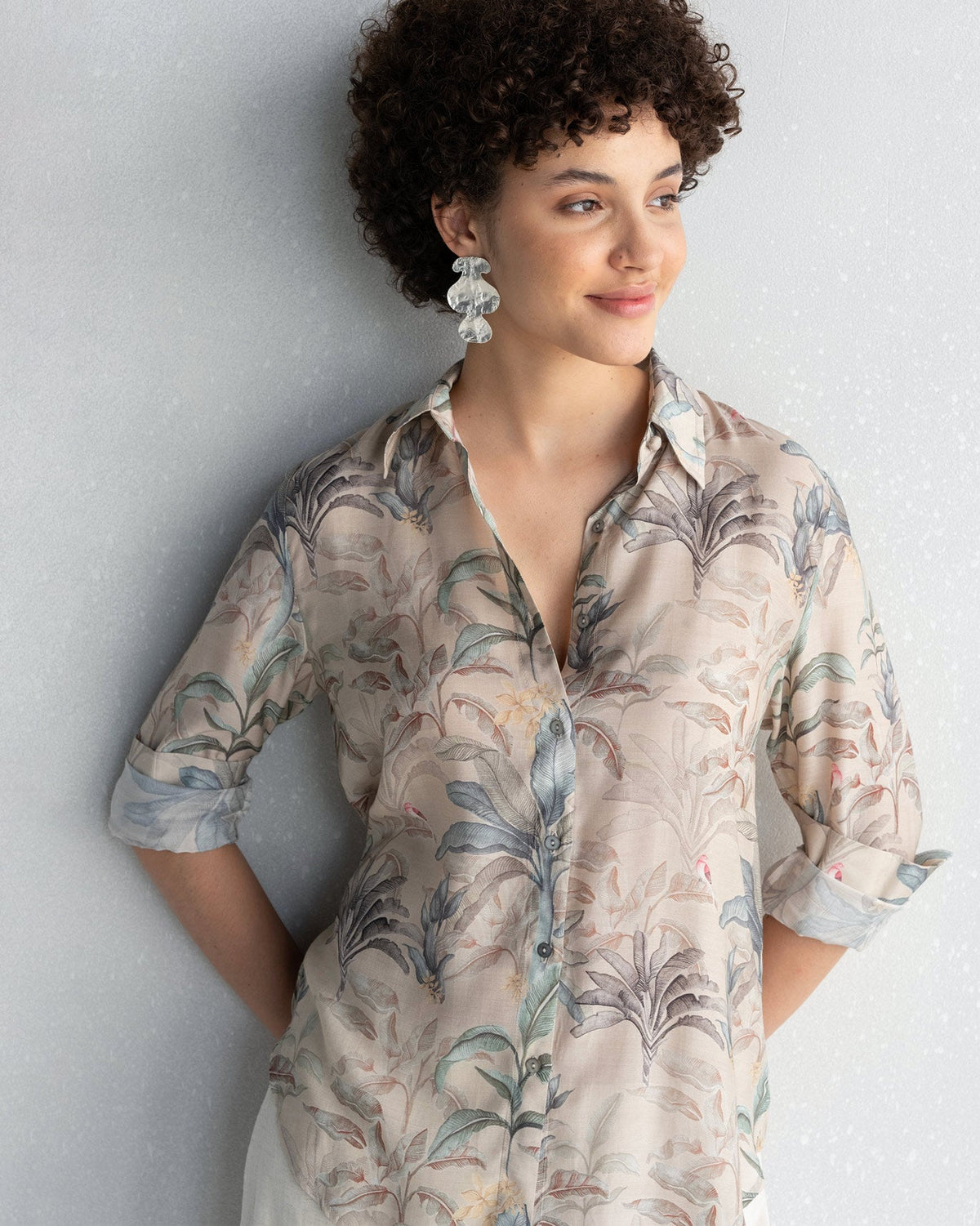 Person wearing a Tropico Shirt with a relaxed fit.