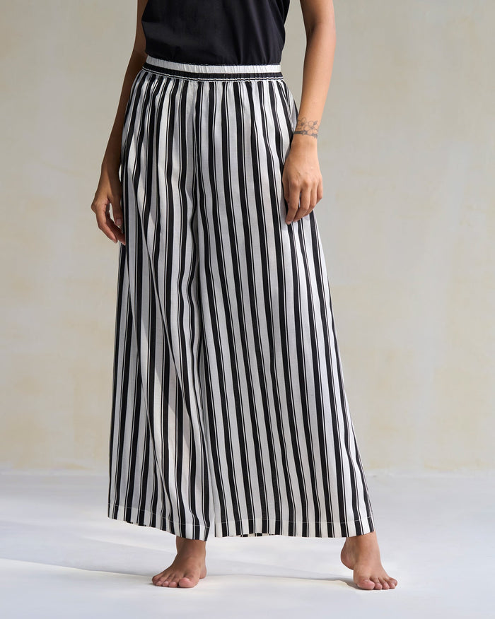 Person wearing black and ivory Celeste Pyjamas.
