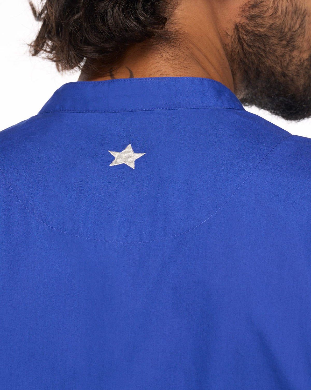 Close-up of the Chest Pocket Kurta back yoke with a small white star embroidery.