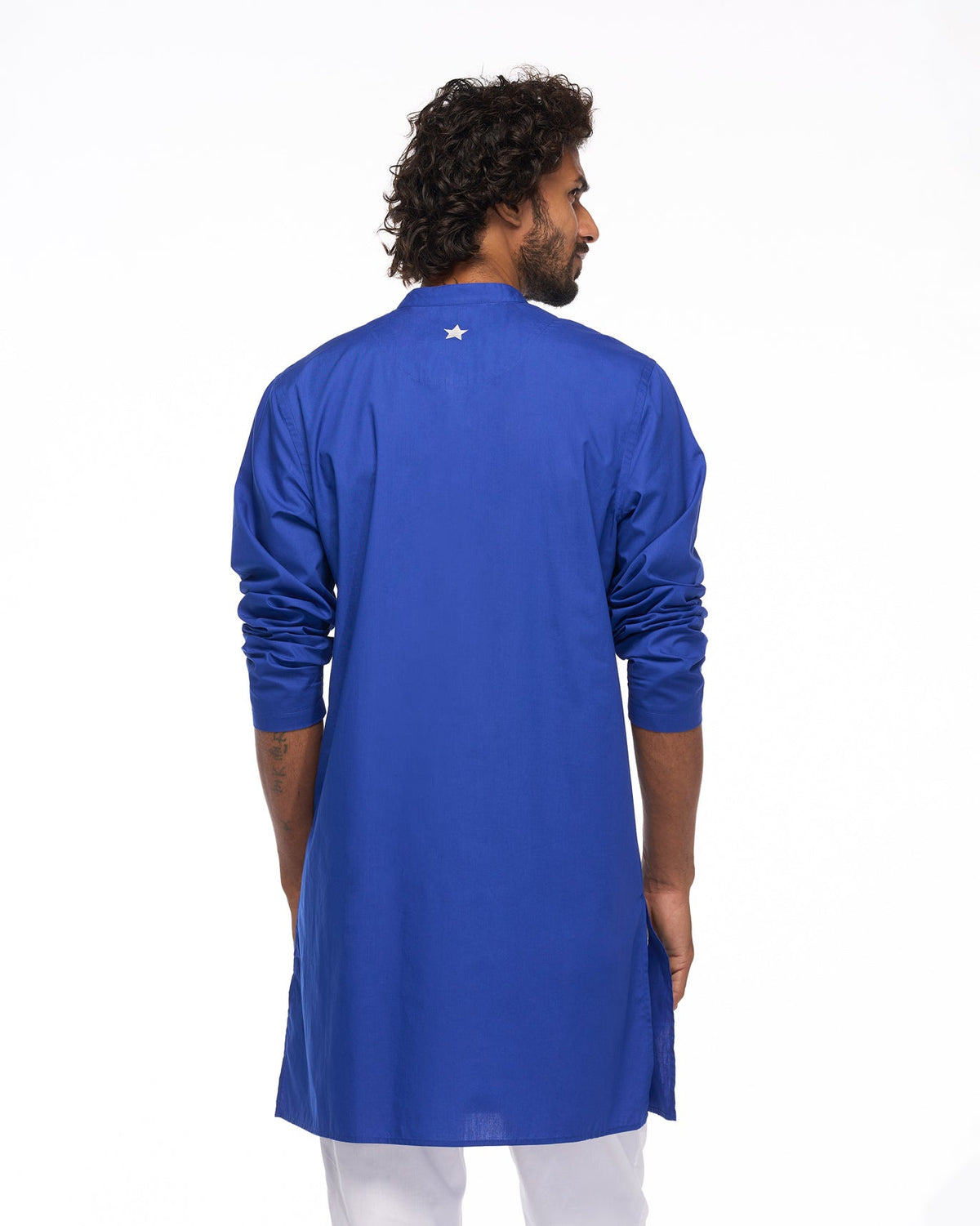 Back of the Chest Pocket Kurta worn by a person, with a small white star at the yoke.