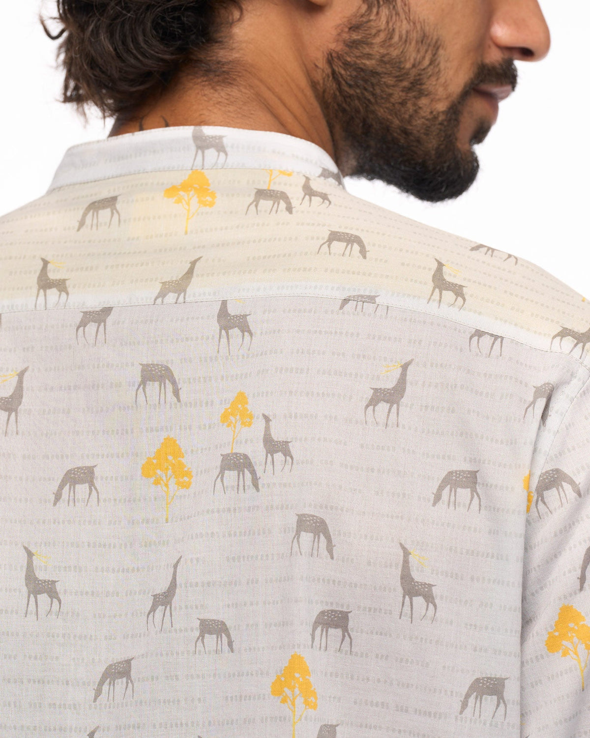 Close-up of the back yoke of a Fort Kurta showing the animal and tree print.