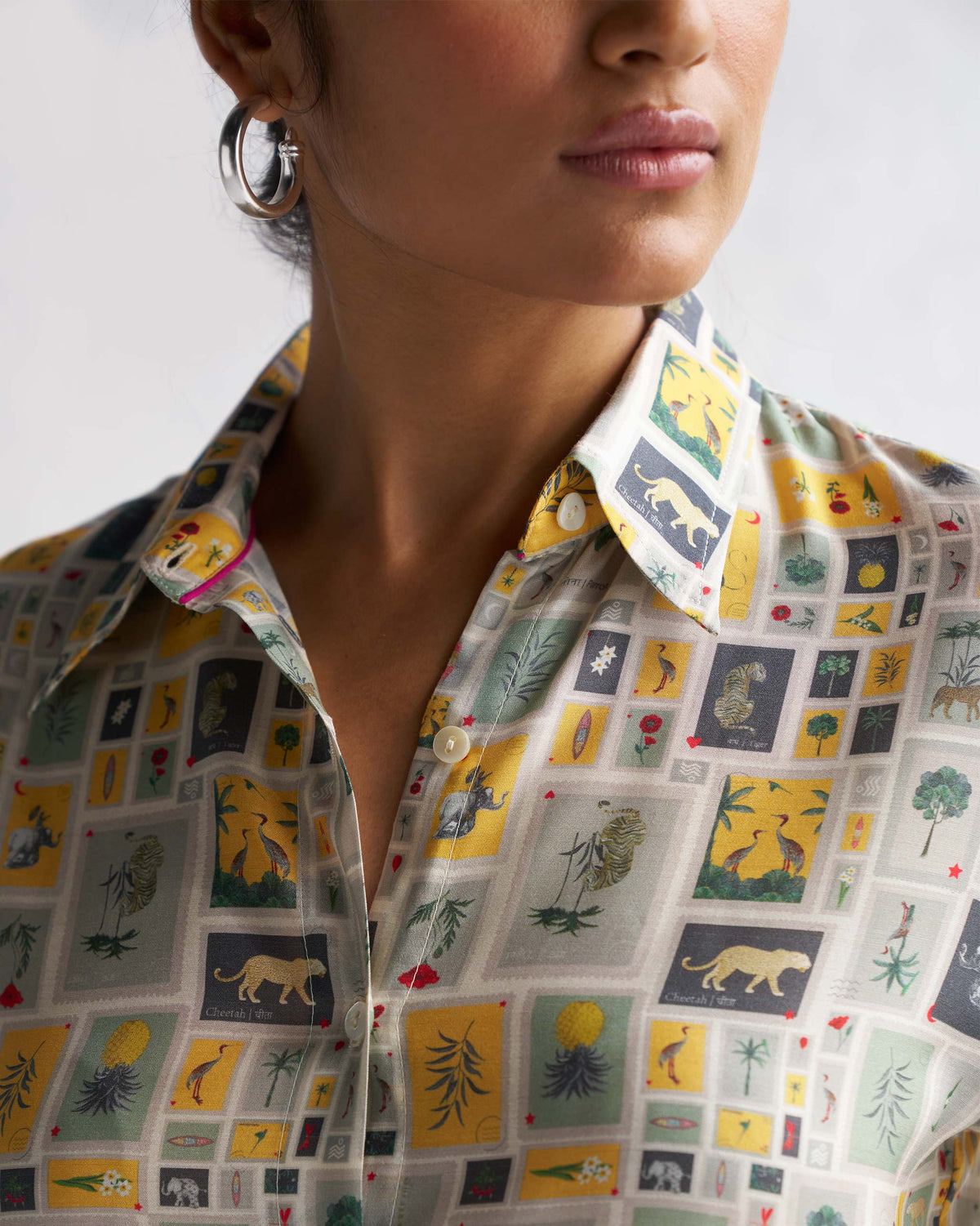 Close-up of the collar of a Basic Shirt showing a tiger in one of the printed tiles.