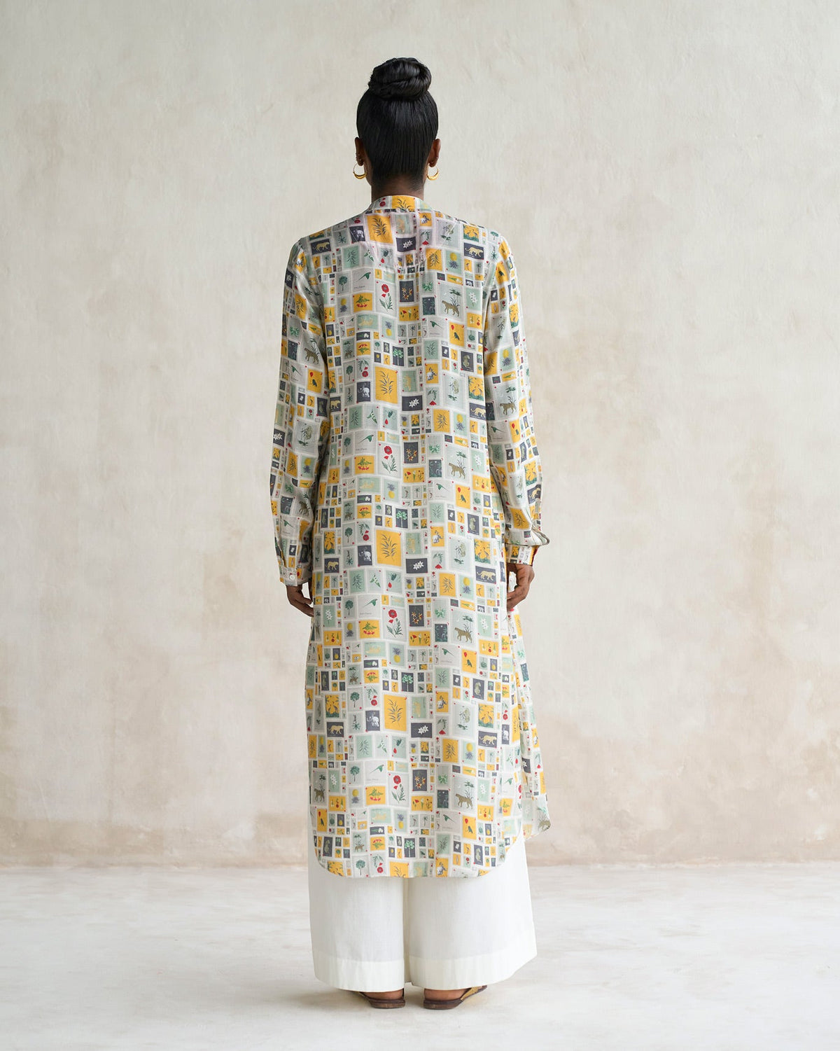 Back of the Basic long length kurta with a framed tile print, worn by a person.
