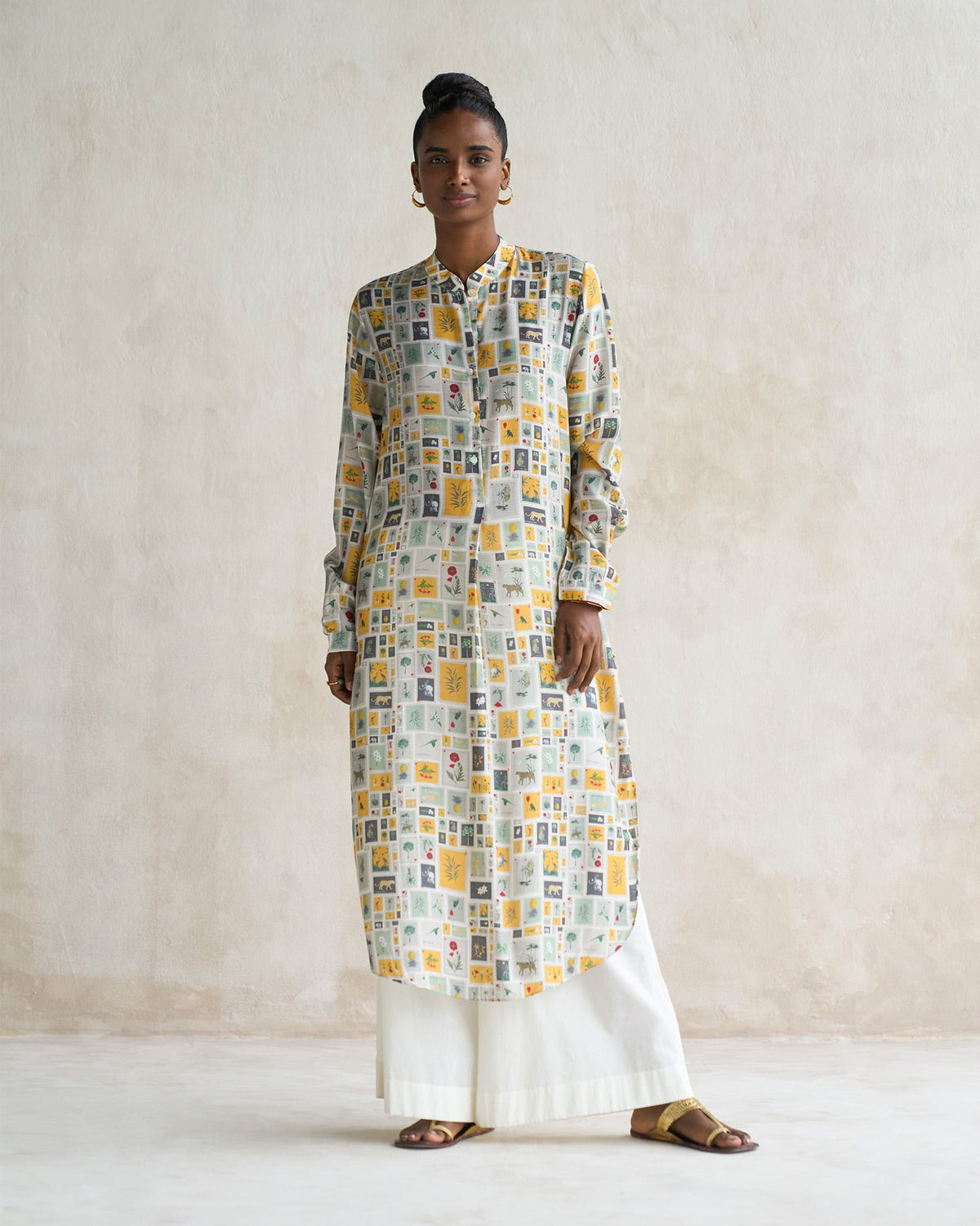Person standing in a Basic long length kurta with a framed tile print and long sleeves.
