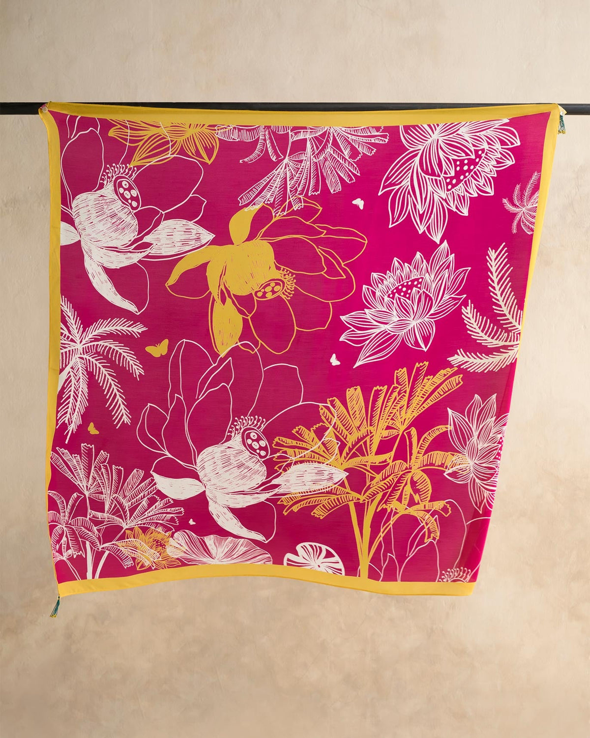 Padma scarf in fuchsia and white with line-drawn flowers and palm leaves.