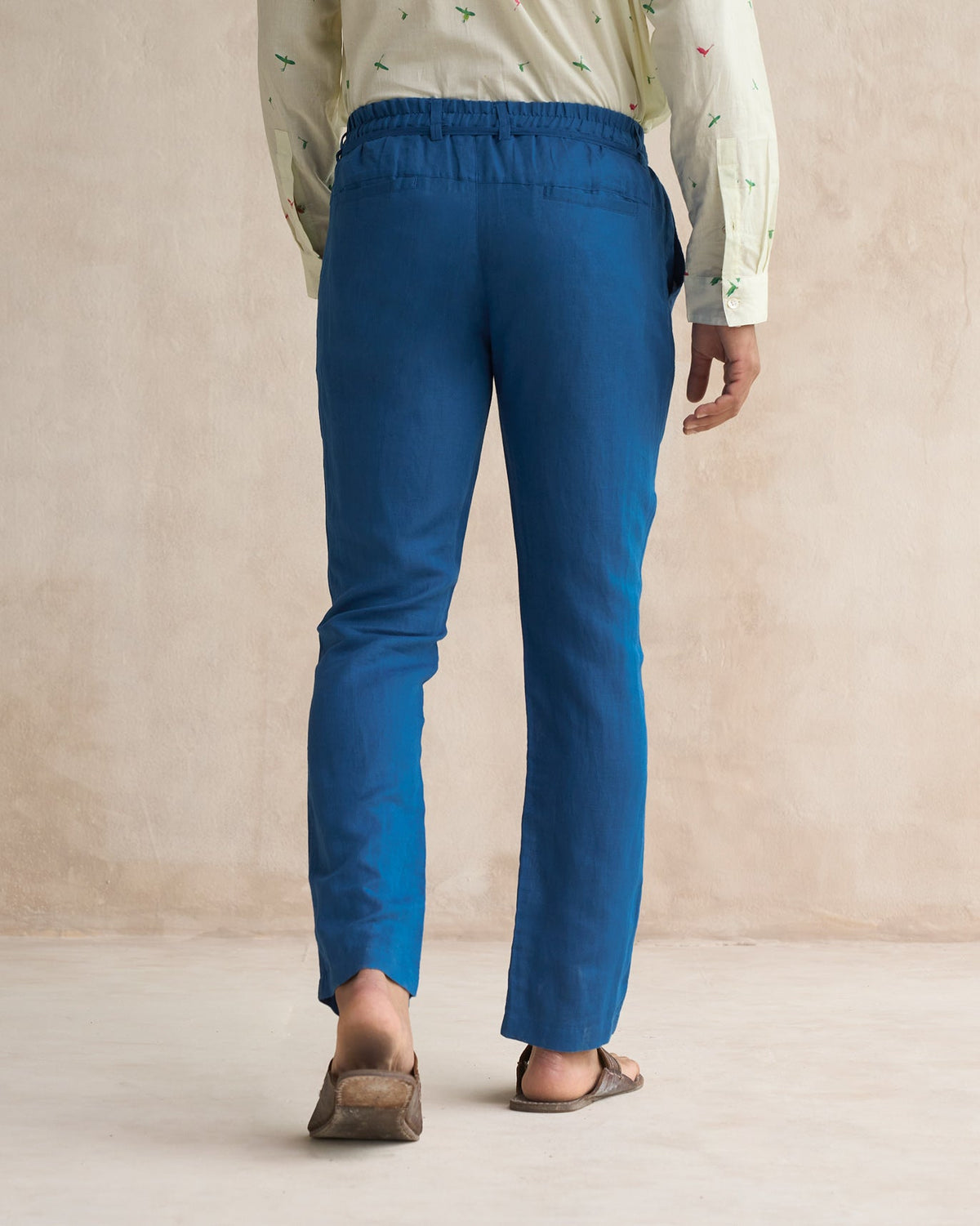Back of sapphire Banjara Trousers worn by a person.