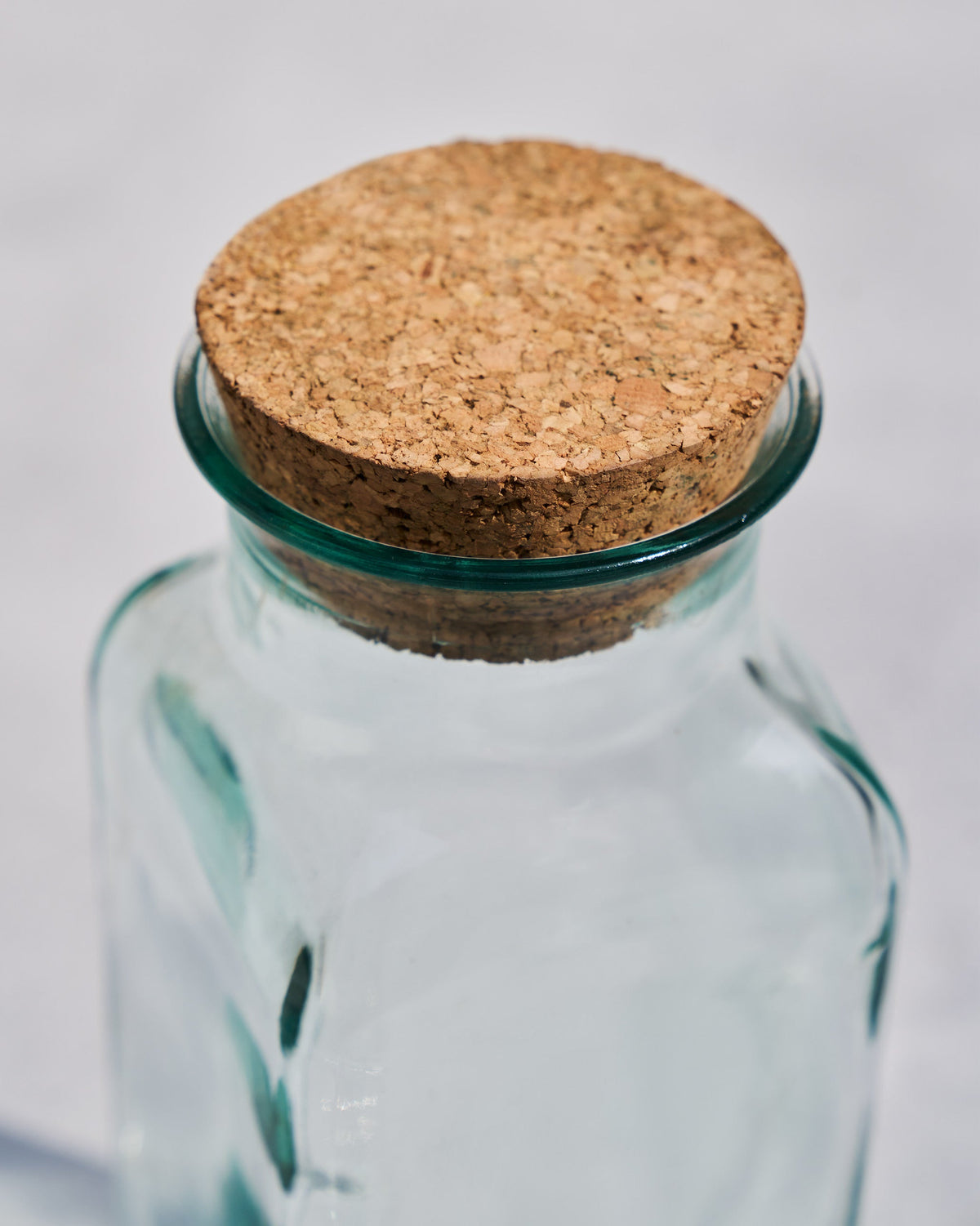 Close-up of the Ibis Tumbler & Carafe cork stopper sitting in the glass neck.