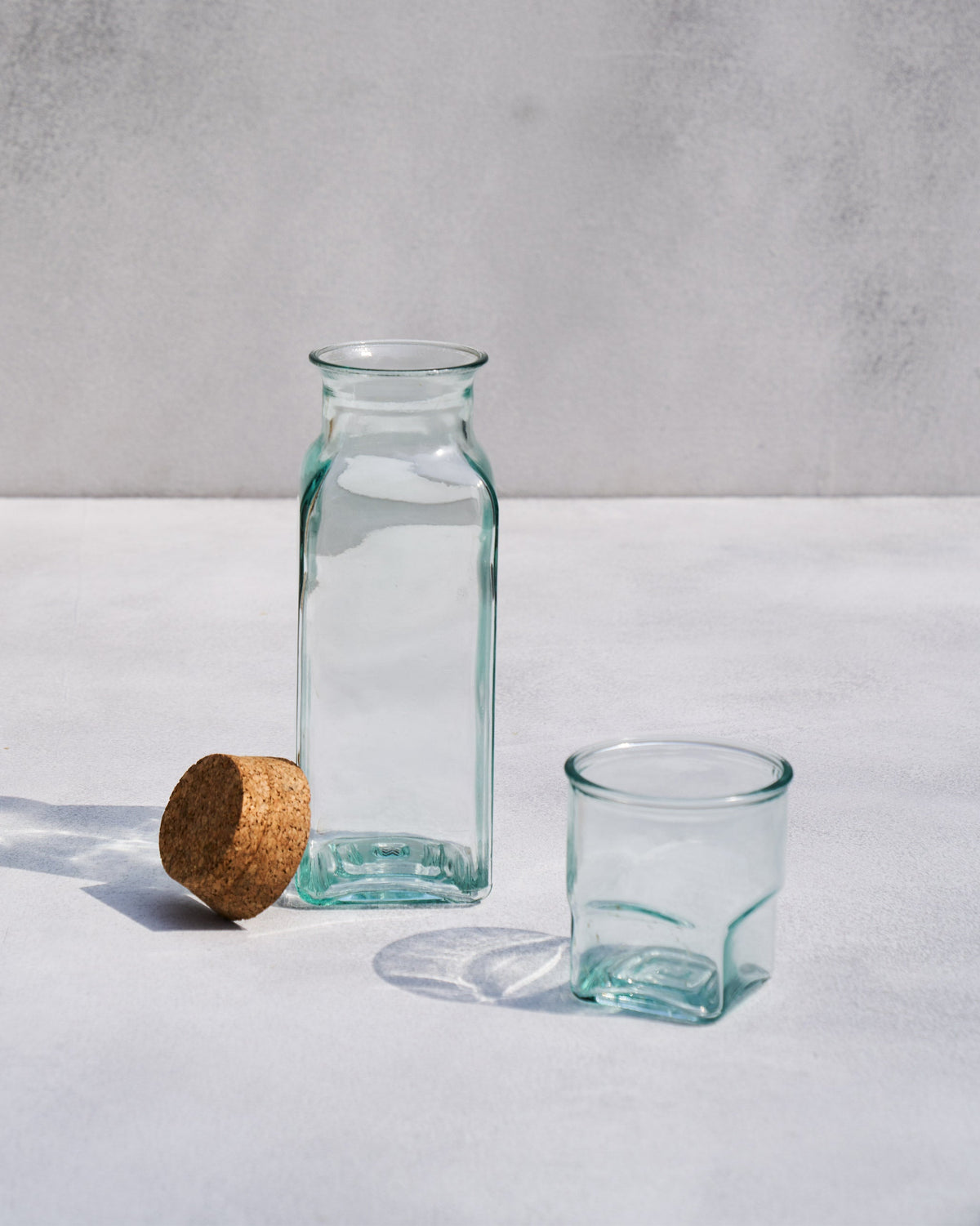 Ibis Tumbler & Carafe with a glass tumbler standing beside the carafe.