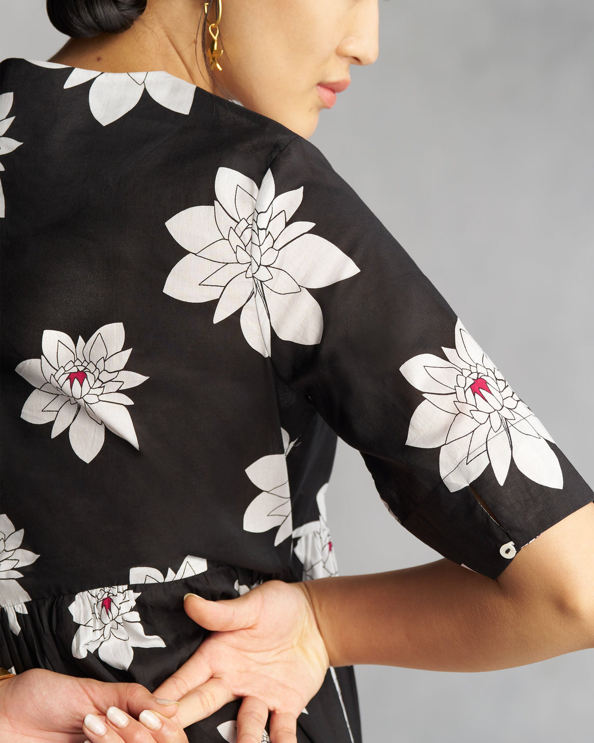 Close-up of the V-Neck Gathered Kurta sleeve showing a small cuff button.