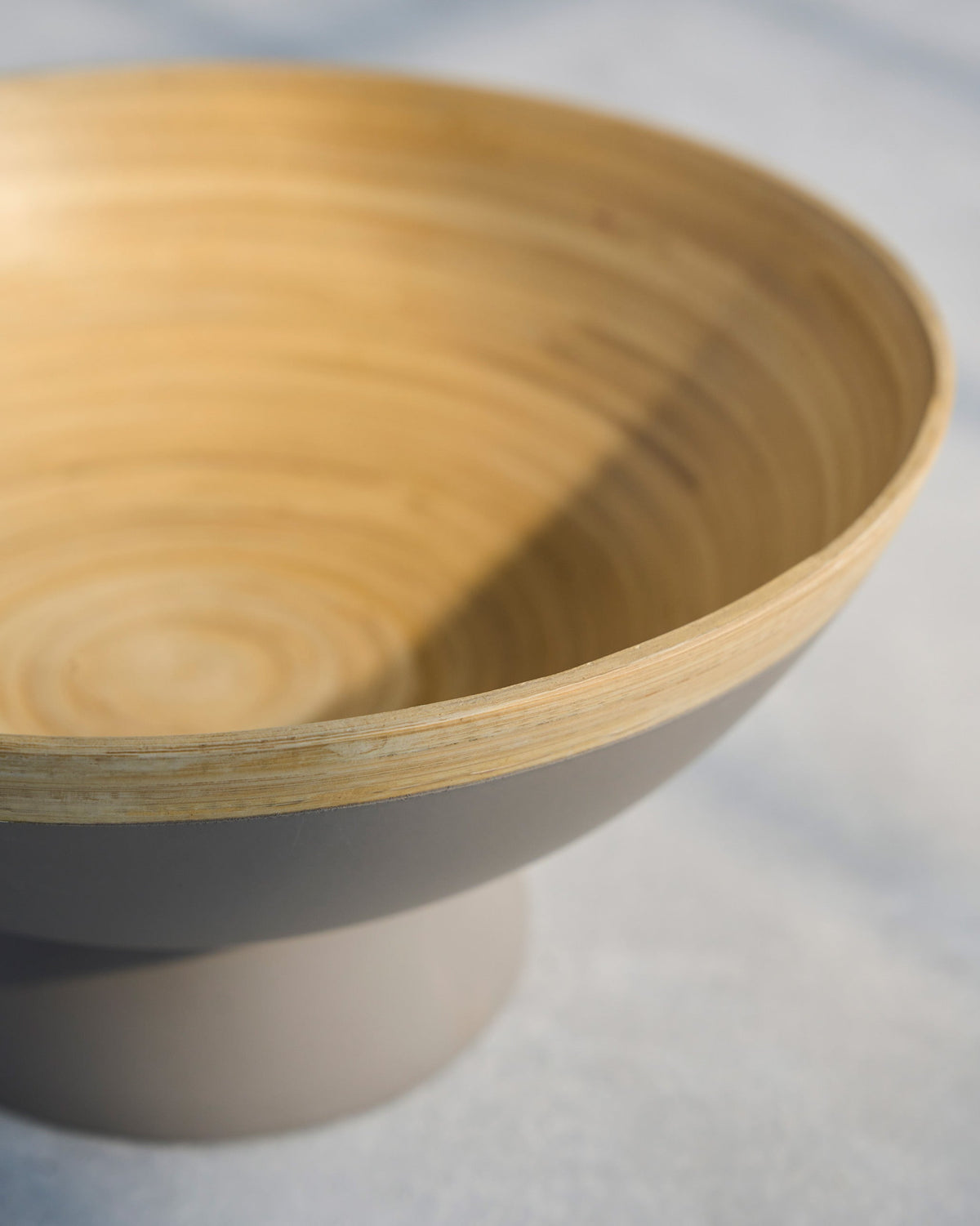Close-up of Phoenix Fruit Bowl showing the light grain inside the rim.