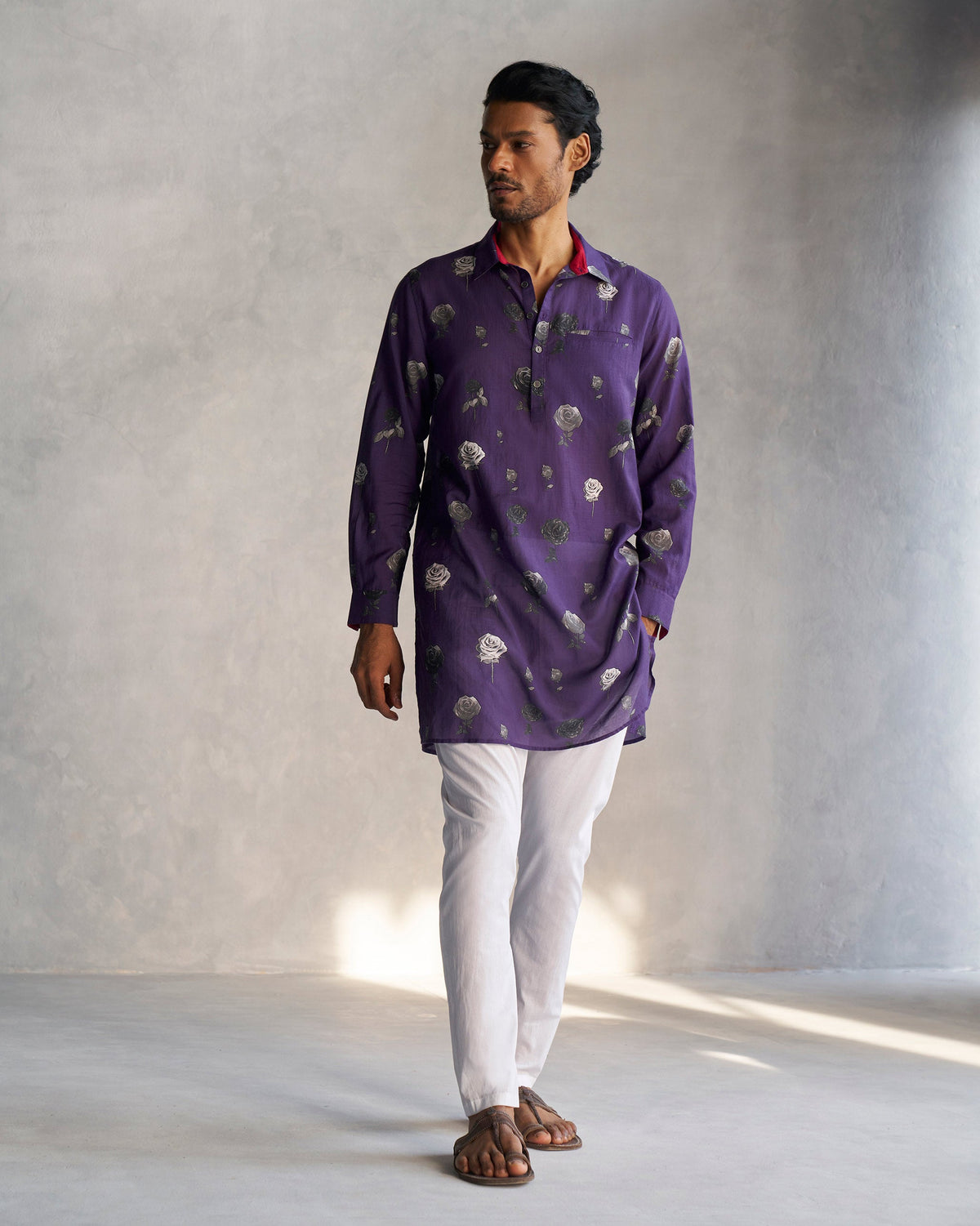 Full-length view of a purple Bouquet Kurta worn by a person.