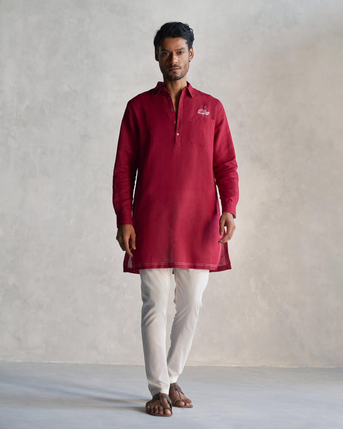 Full-length view of a red Garnet Kurta worn by a person.