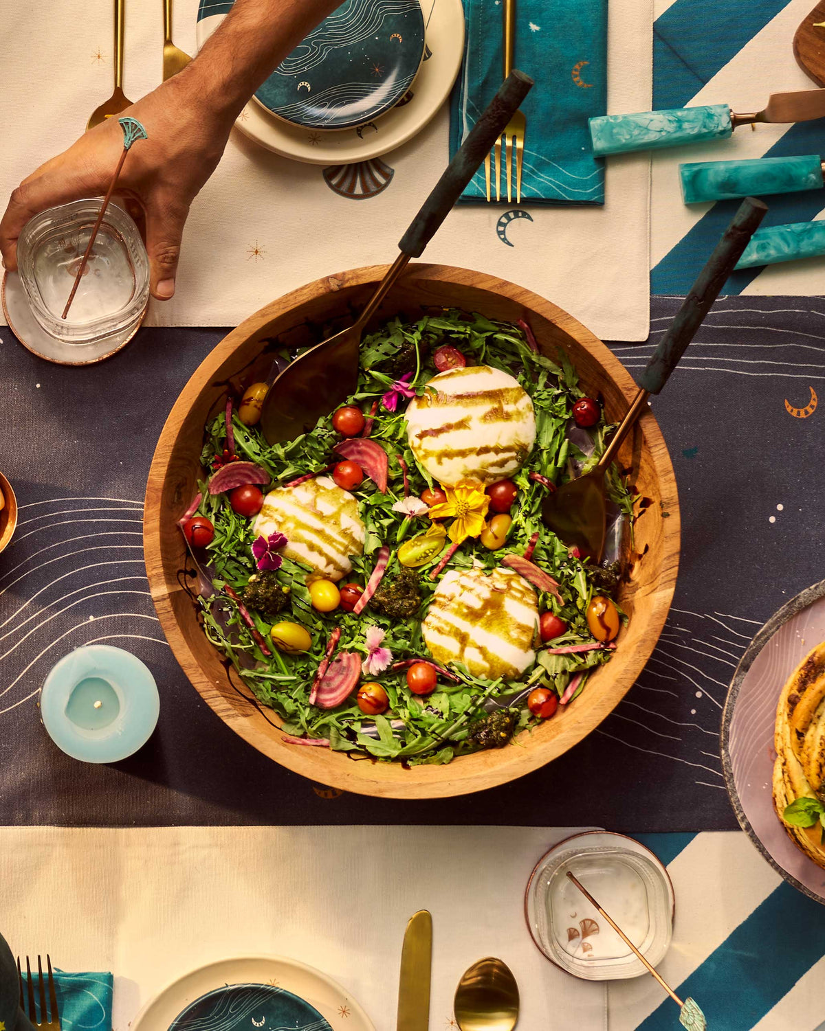 Garden Salad Bowl filled with leafy salad, cherry tomatoes and cheese slices.