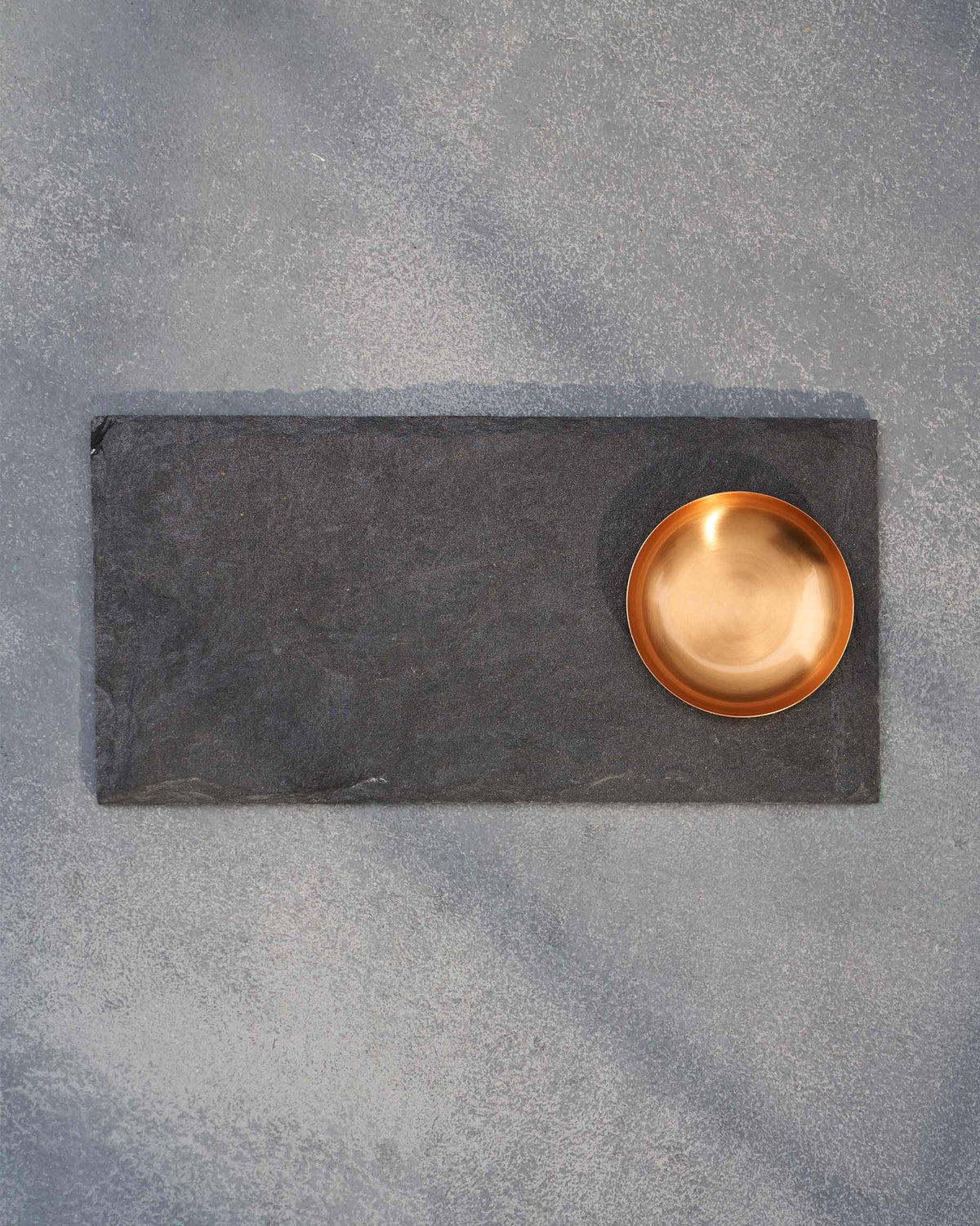 Luna Chip & Dip Platter with a round gold-toned bowl set into a dark grey platter.