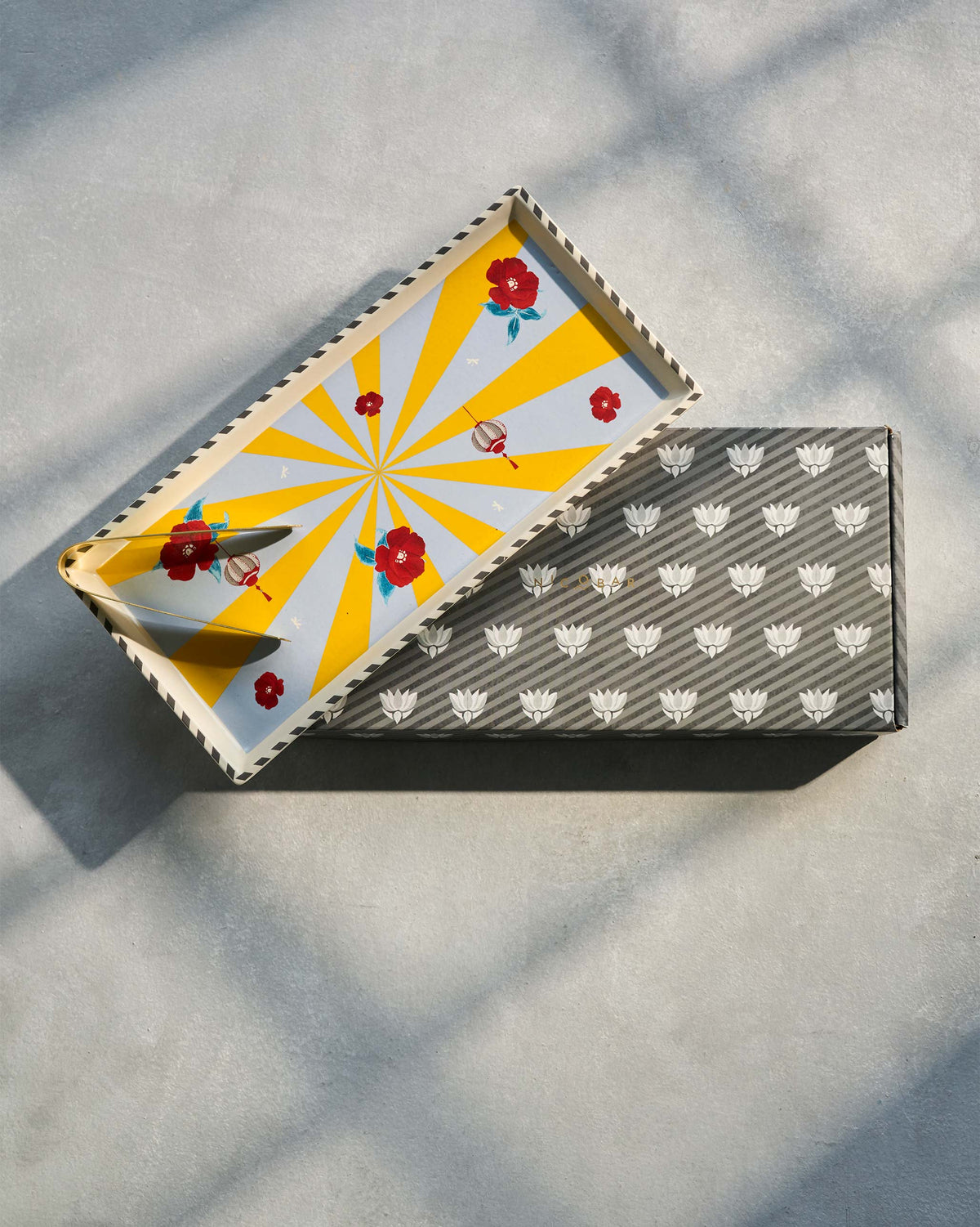 Chakra Cookie Tray set on a patterned grey box.