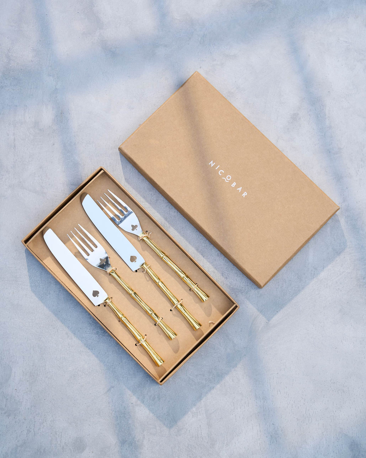 Spade & Club cutlery set of four in a Nicobar gift box.
