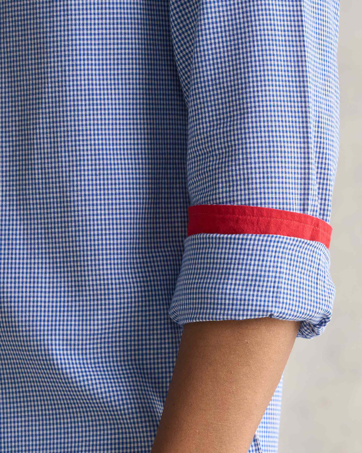 Close-up of the Bias Placket Shirt sleeve cuff with a red band.