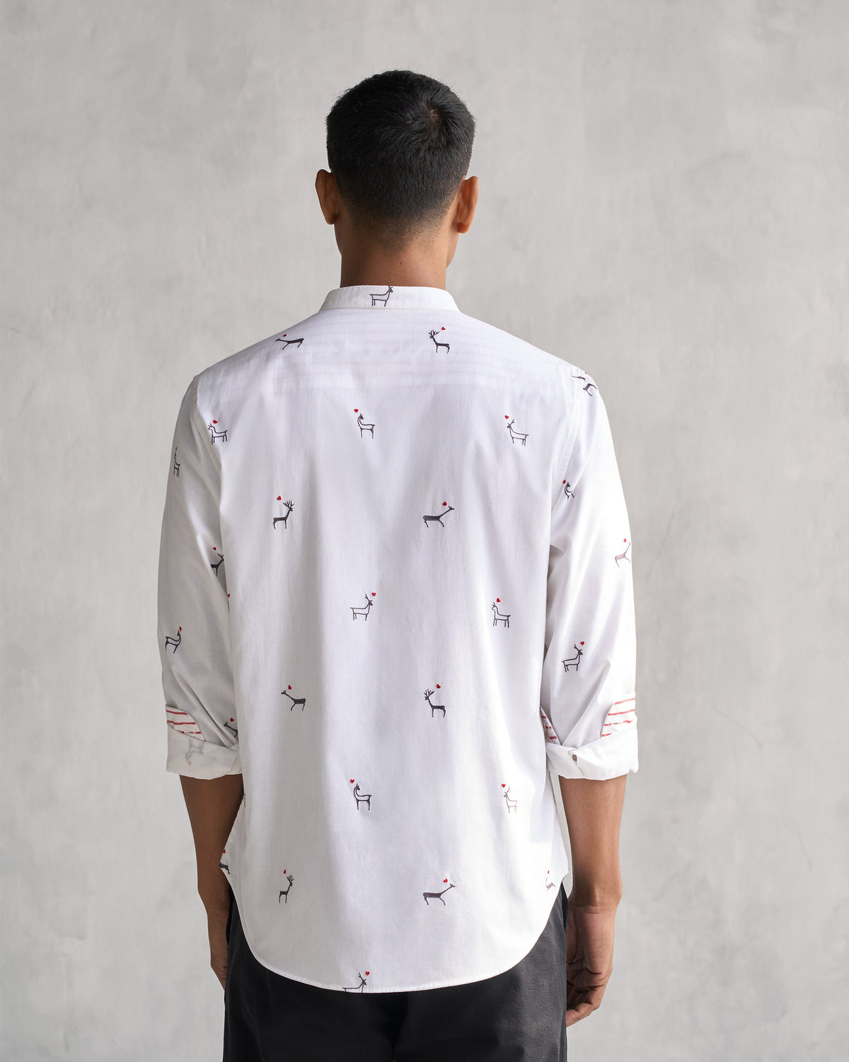 Back of the Classic Band Collar Shirt with embroidered deer across it, worn by a person.