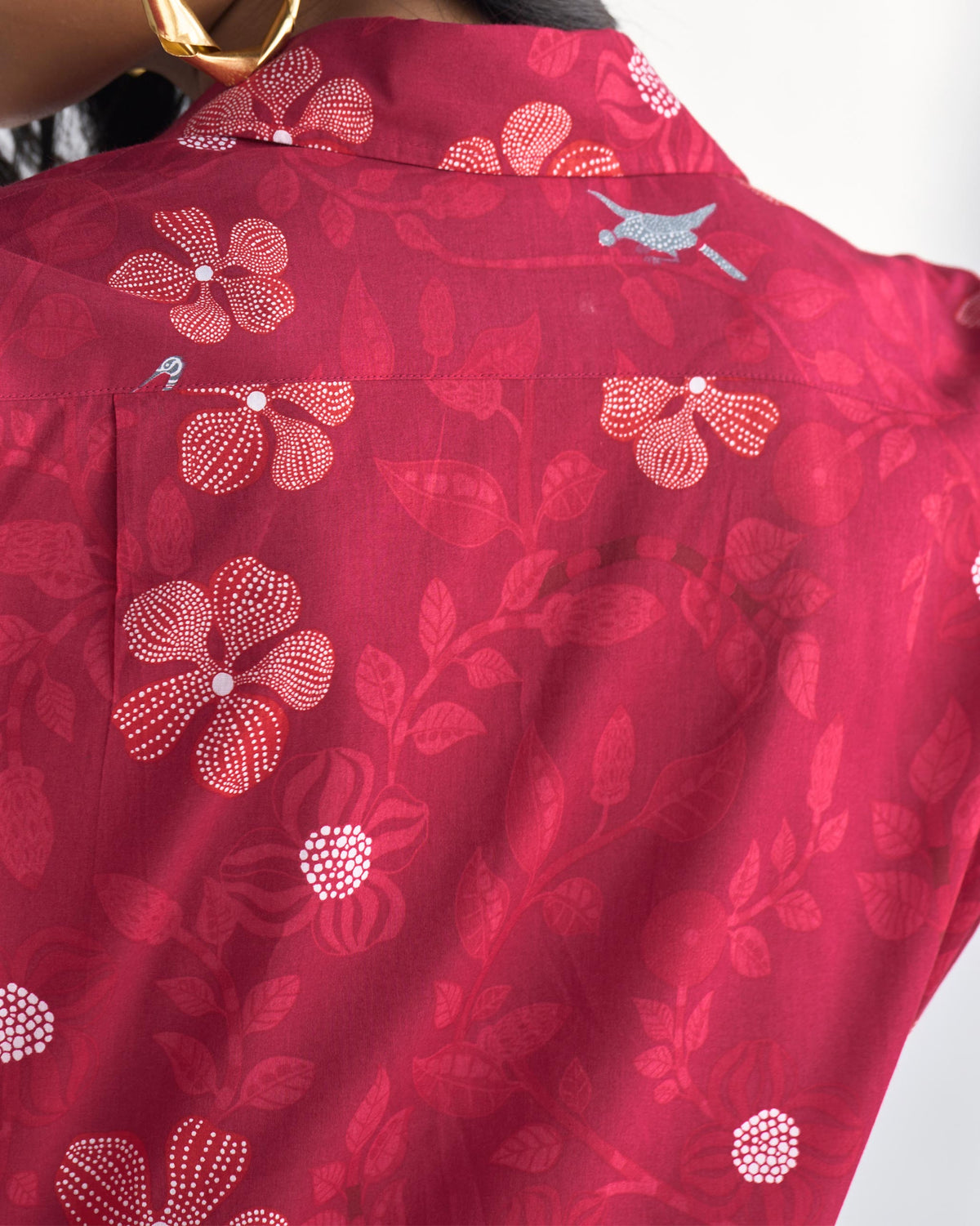 Close-up of the Tropico Shirt collar showing a floral print and a small bird motif.