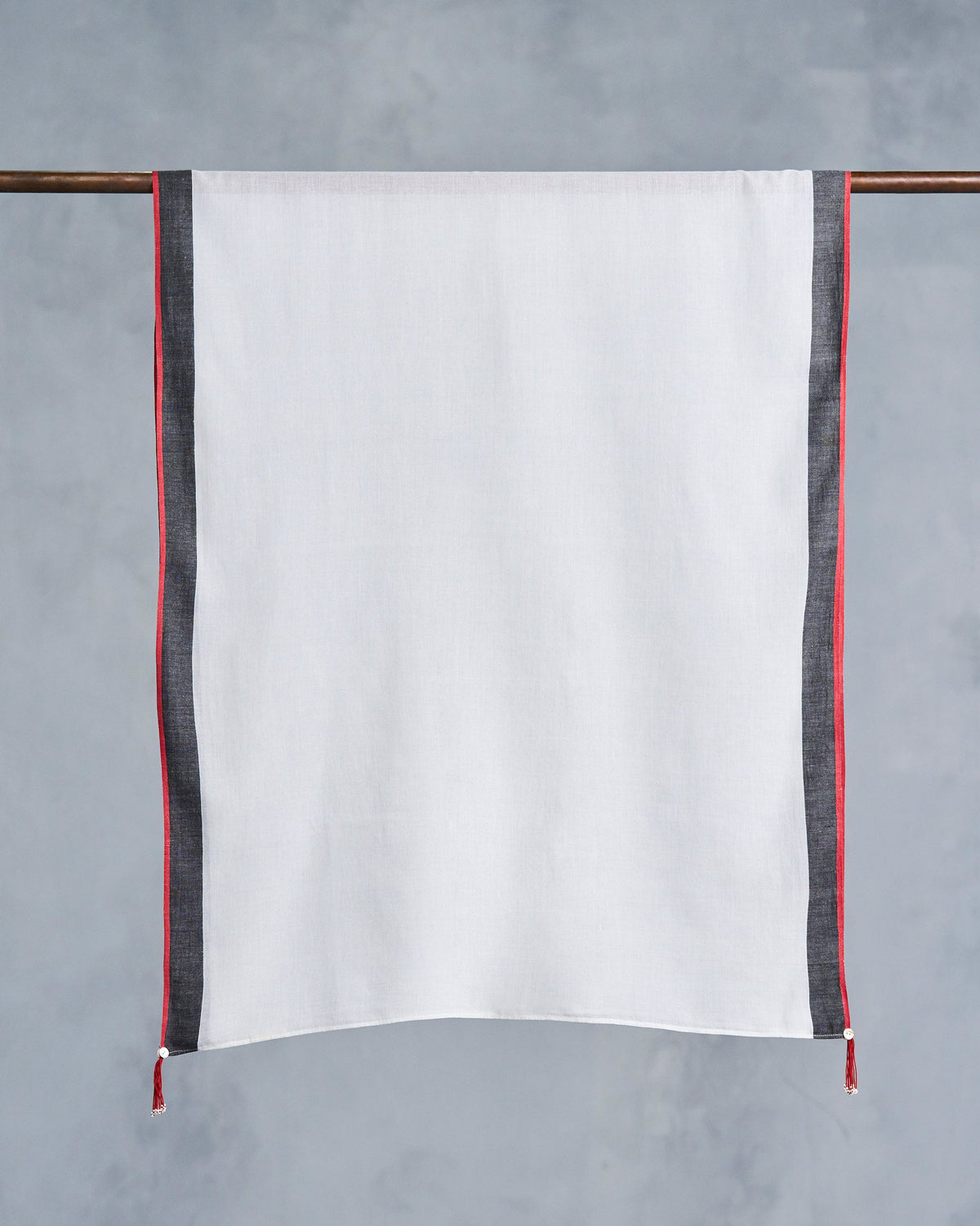 Ivory Jalsa Scarf hung flat, with grey and red edge stripes.