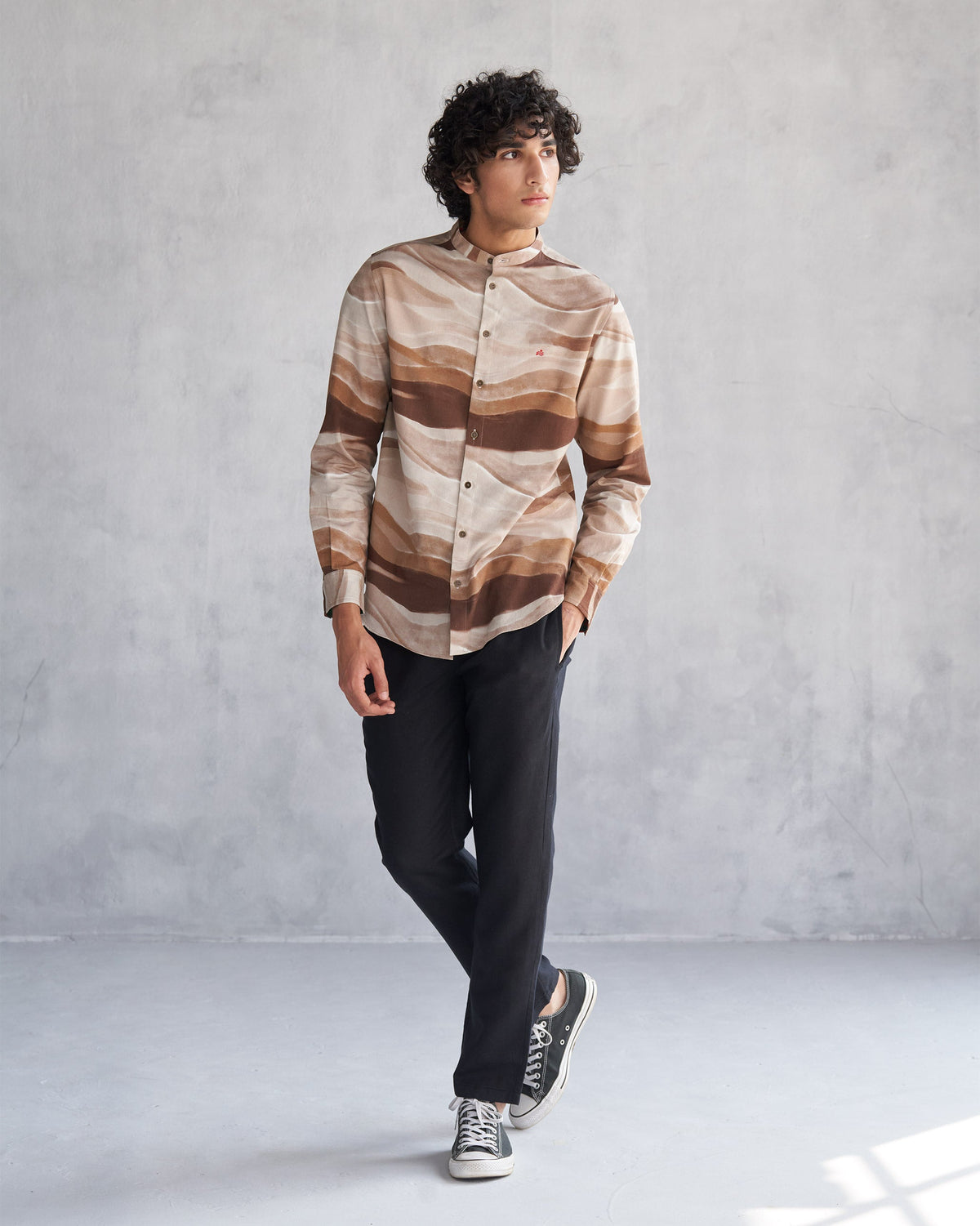 Full-length front of a brown wave print Nawab shirt worn by a person.