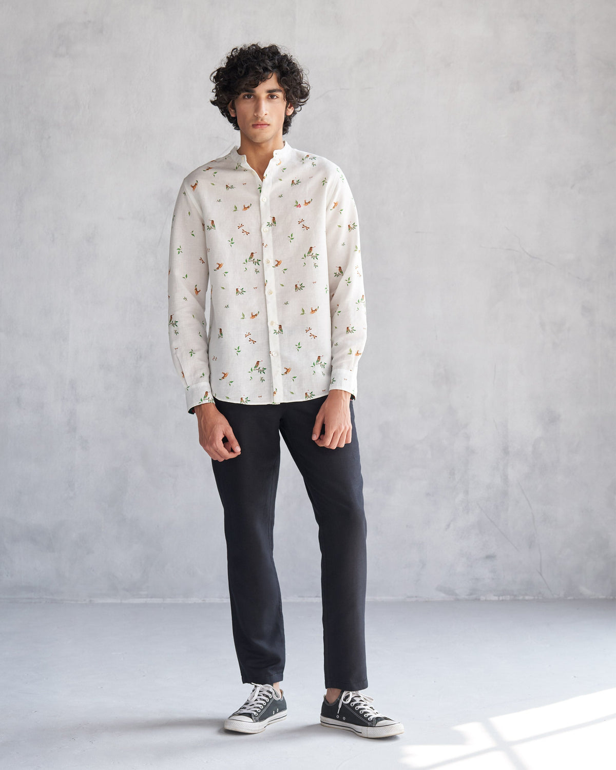 Full-length view of a white Nawab Shirt worn by a person.