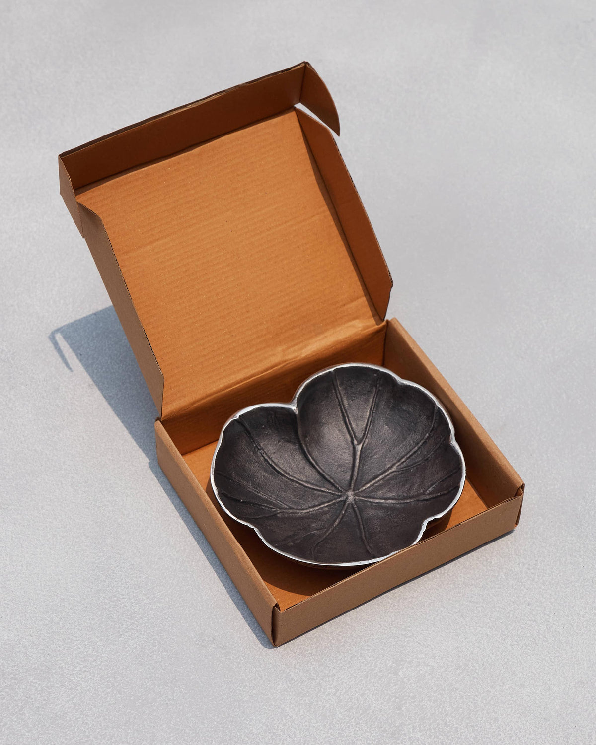 Kamal Leaf Trinket Tray in an open brown gift box.