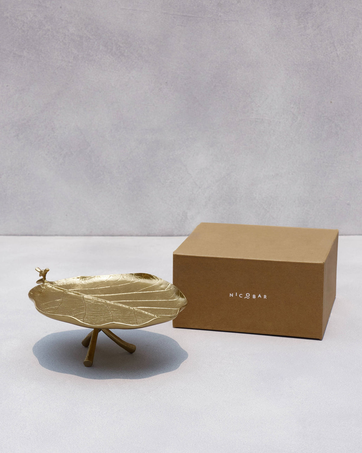 Leaf Deco Tray beside a Nicobar gift box.