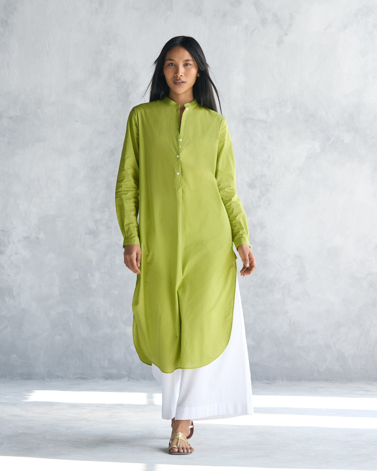 Person wearing a lime Basic long length kurta with full sleeves.