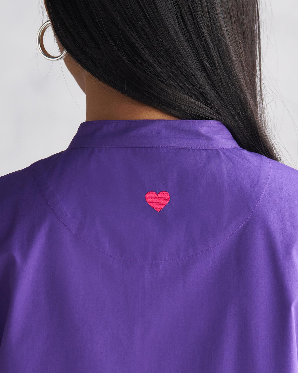 Close-up of purple Short Sleeve Kurta back collar showing a pink heart embroidery.