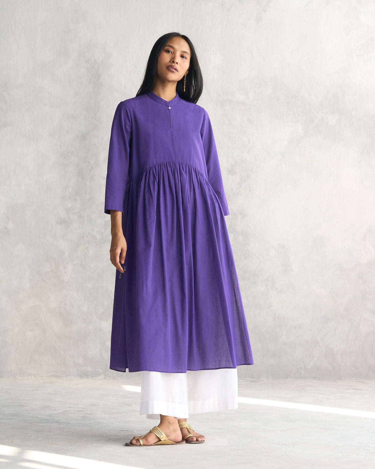 Person wearing the purple Waist Gathered Kurta.