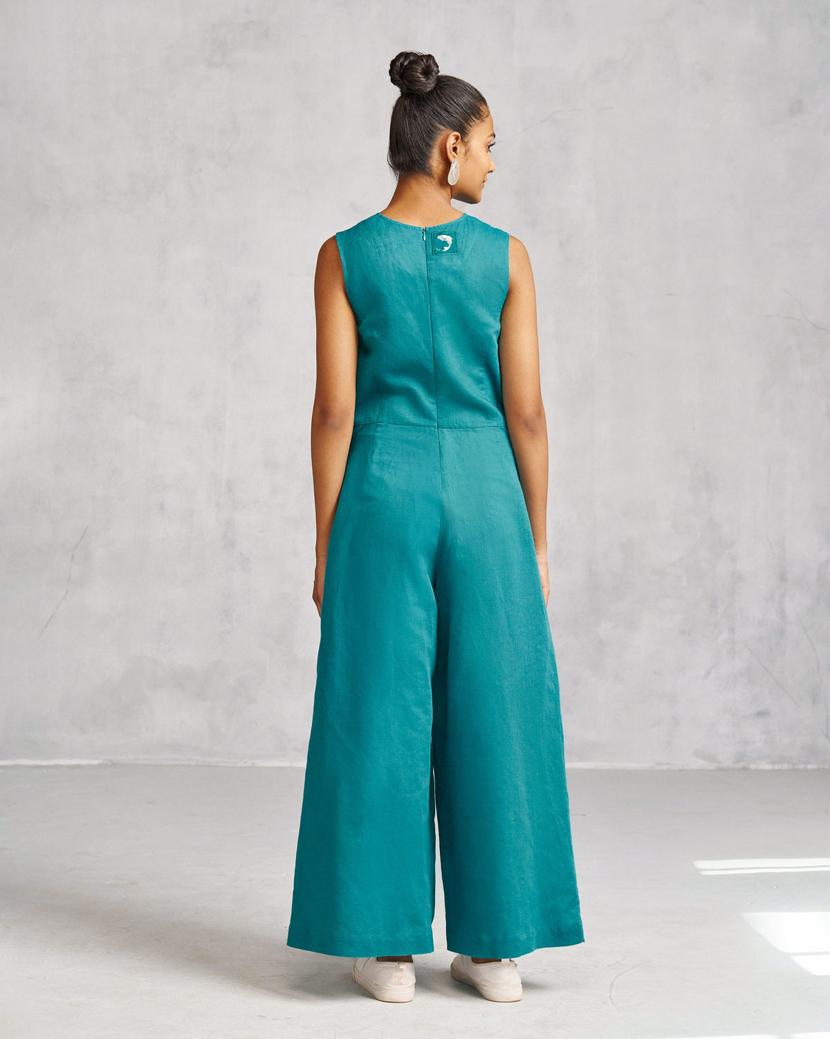 Back of the Front Knot Jumpsuit worn by a person, showing the wide legs.
